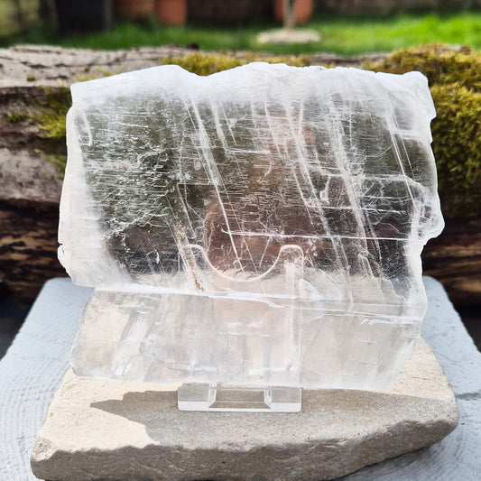 This striking Selenite Window, also known as “Utah Ice,” comes directly from the Glitter Mountain site on the Utah-Arizona border. Naturally formed with exceptional clarity and shine, these high-quality pieces are carefully selected for their purity and luminous appearance.