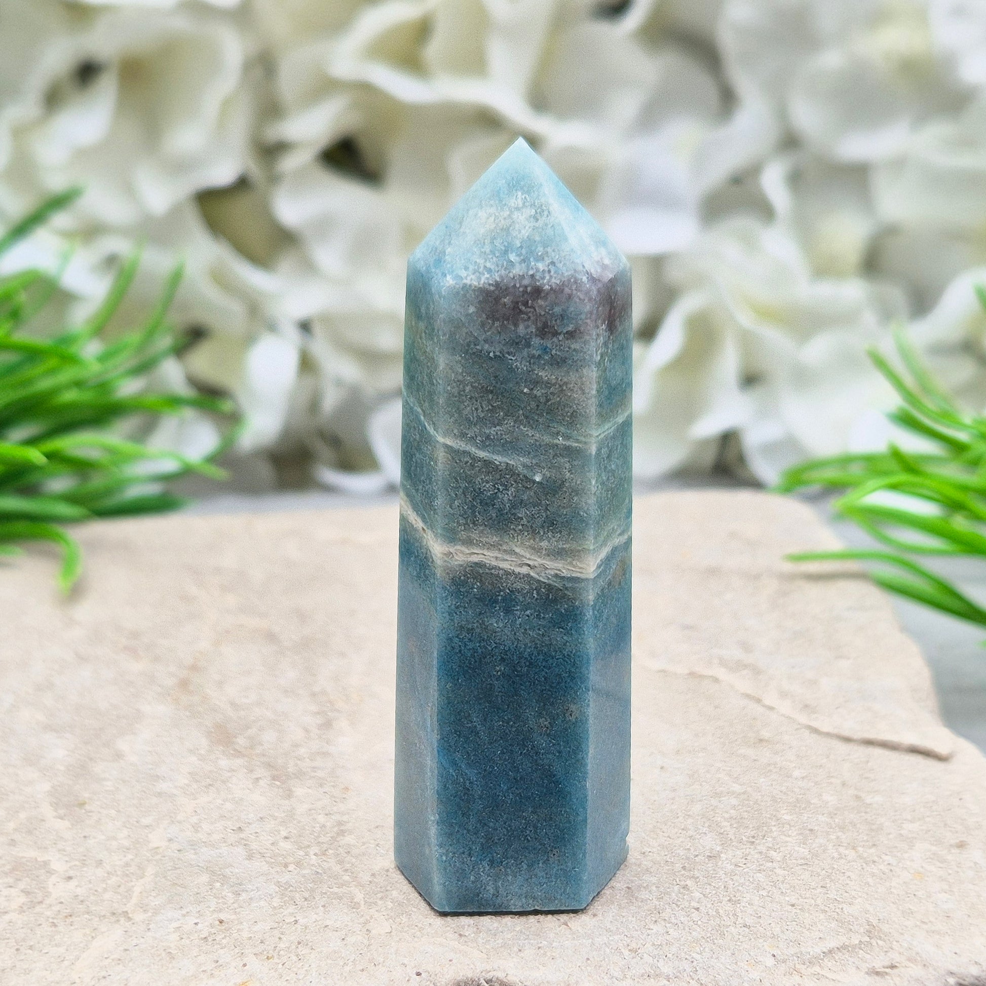 This beautiful Trolleite Point/Tower comes from Brazil, showcasing its calming bluish-gray hues. Perfectly balanced for energy work, this point is designed to direct and amplify energy upright and outward. Trolleite is cherished for its ability to promote focus, calm the mind, and deepen spiritual connection.