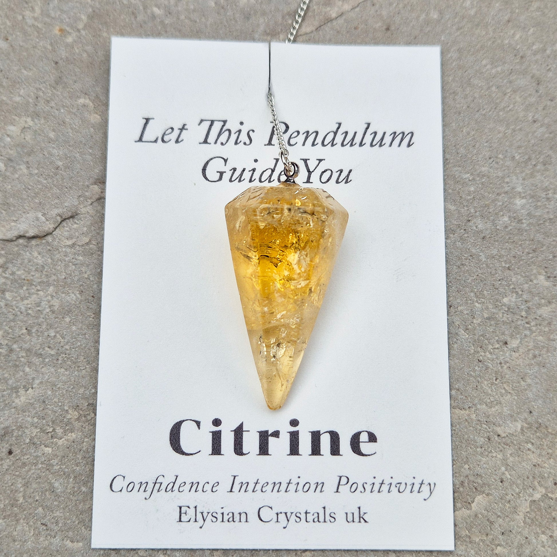 Citrine Crystal Pendulum from Brazil. These stunning sunny pendulums carry the warm, golden glow Citrine is loved for. Each has a yellow bead at the end of the chain making it comfortable to hold and easy to use. 