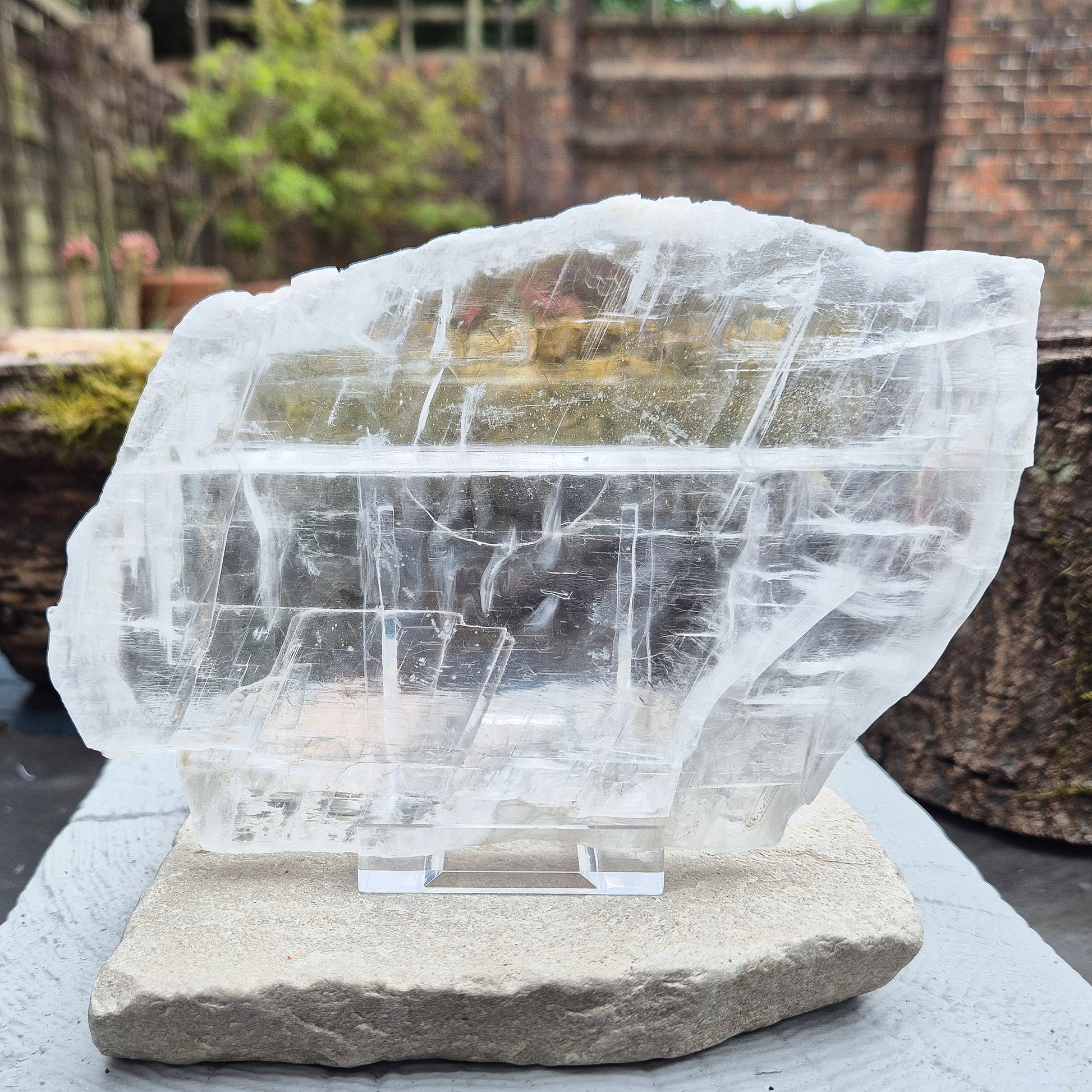 This striking Selenite Window — also known as Utah Ice — comes directly from the Glitter Mountain site near the Utah-Arizona border. It’s a true collector’s piece, naturally smooth with a glossy, high-lustre finish and exceptional internal clarity. 