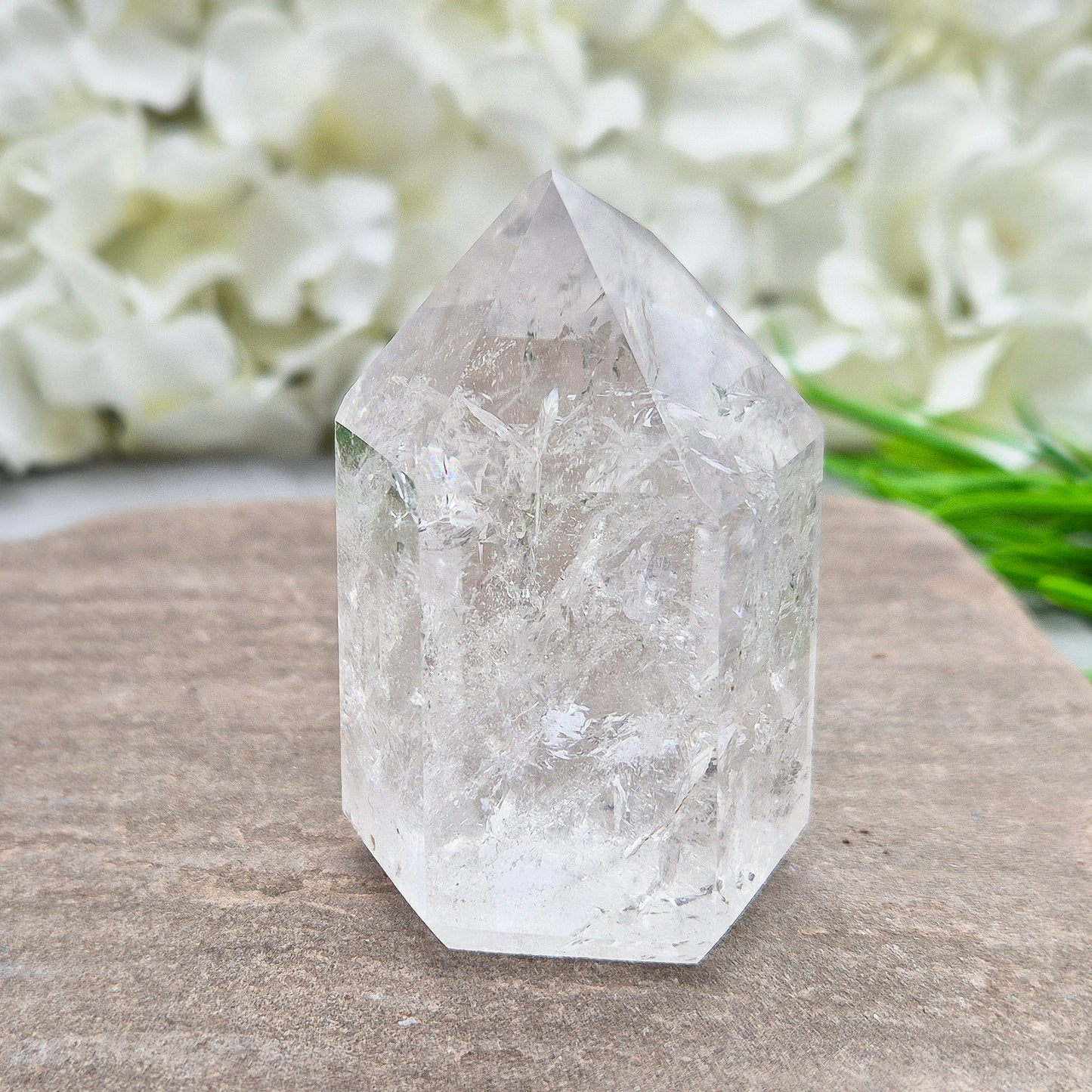 This Clear Quartz Polished Point is a radiant, light-filled crystal with clarity, sparkle, and high vibration A striking example of Brazilian Quartz. 