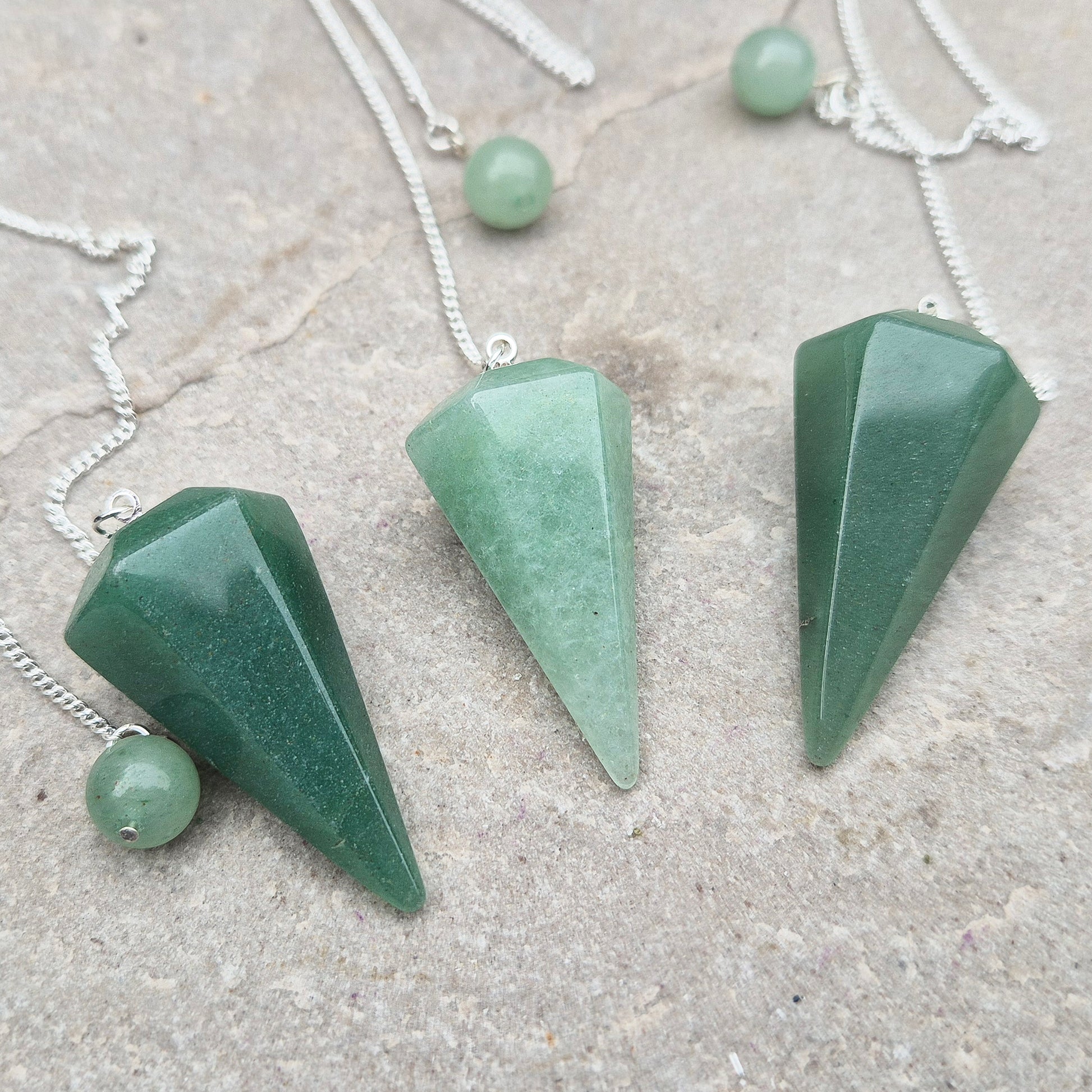 This beautiful Green Aventurine crystal pendulum features a Green Aventurine crystal pendulum and a green bead at the end of the chain. 