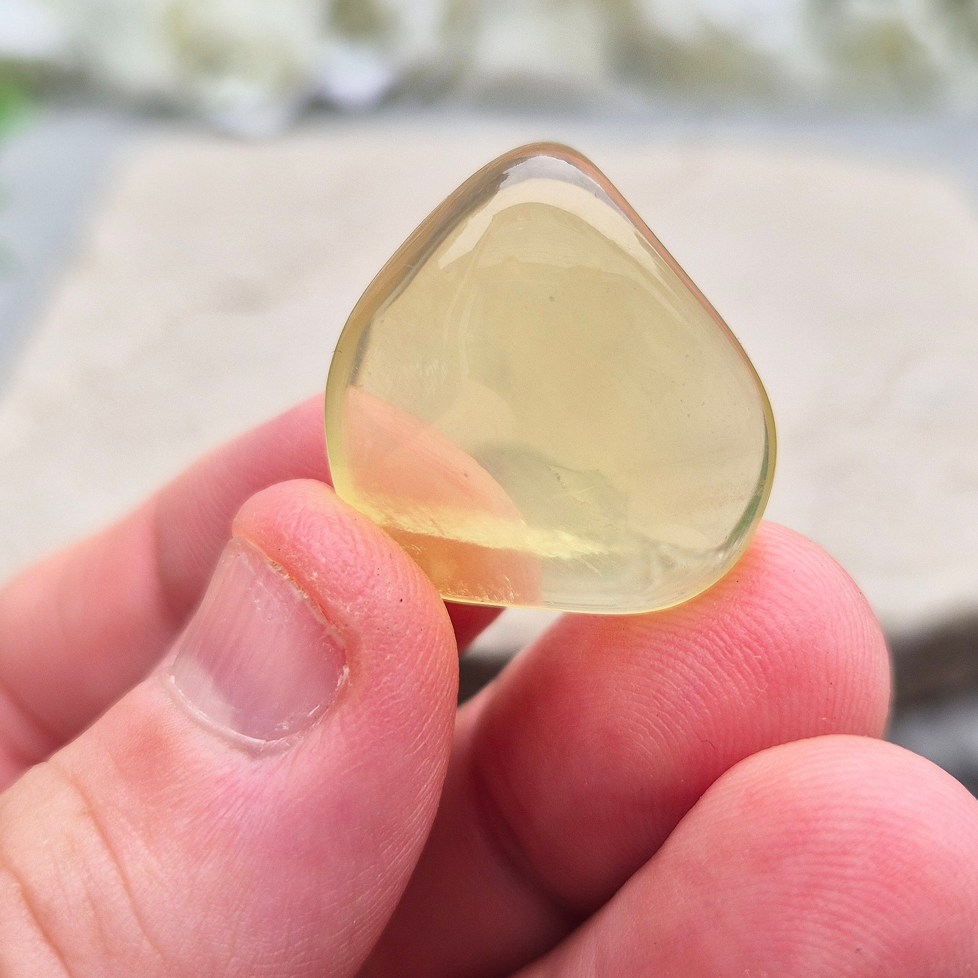 A rarer form of quartz with a distinctive olive-green tone, this Ouro Verde Quartz comes ready to display in a clear sample box (which can be removed if you prefer to carry or grid with it). 