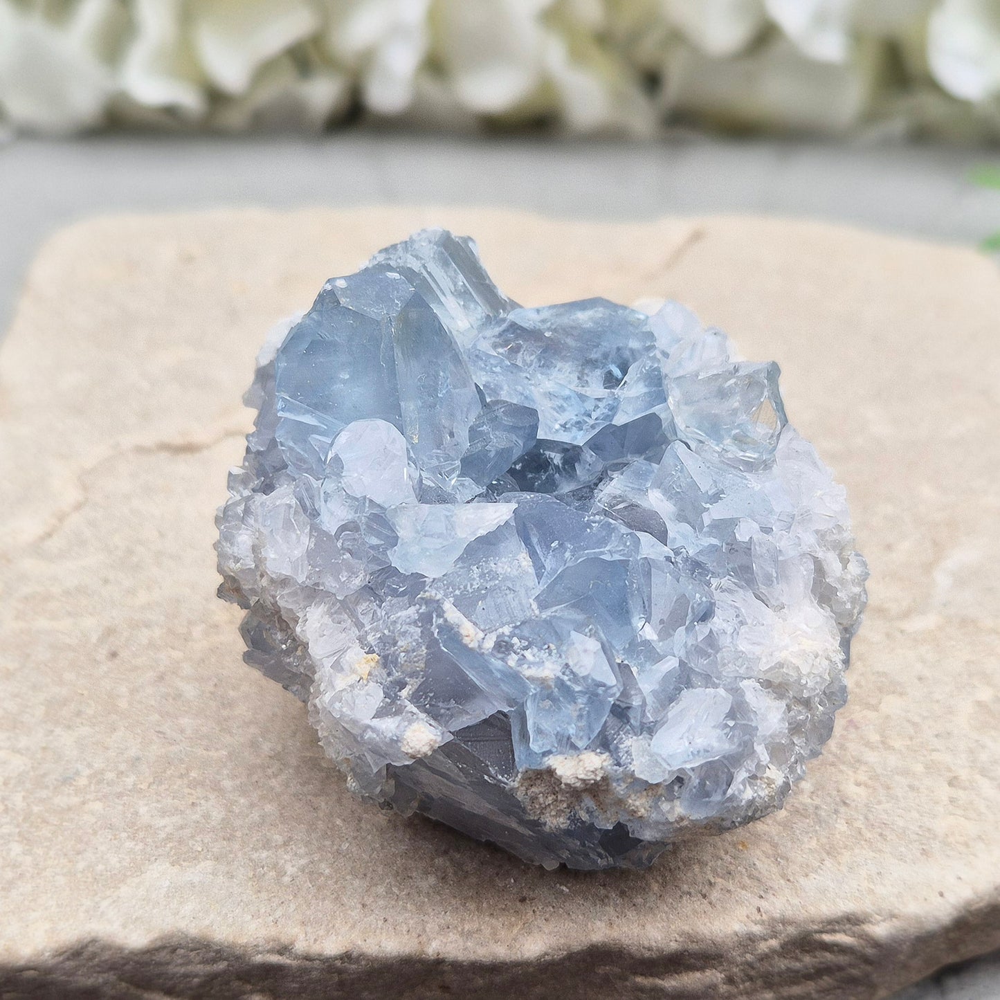 Celestite Crystal Cluster from Madagascar. This beautiful cluster features sparkling sky-blue crystals on a natural matrix. 