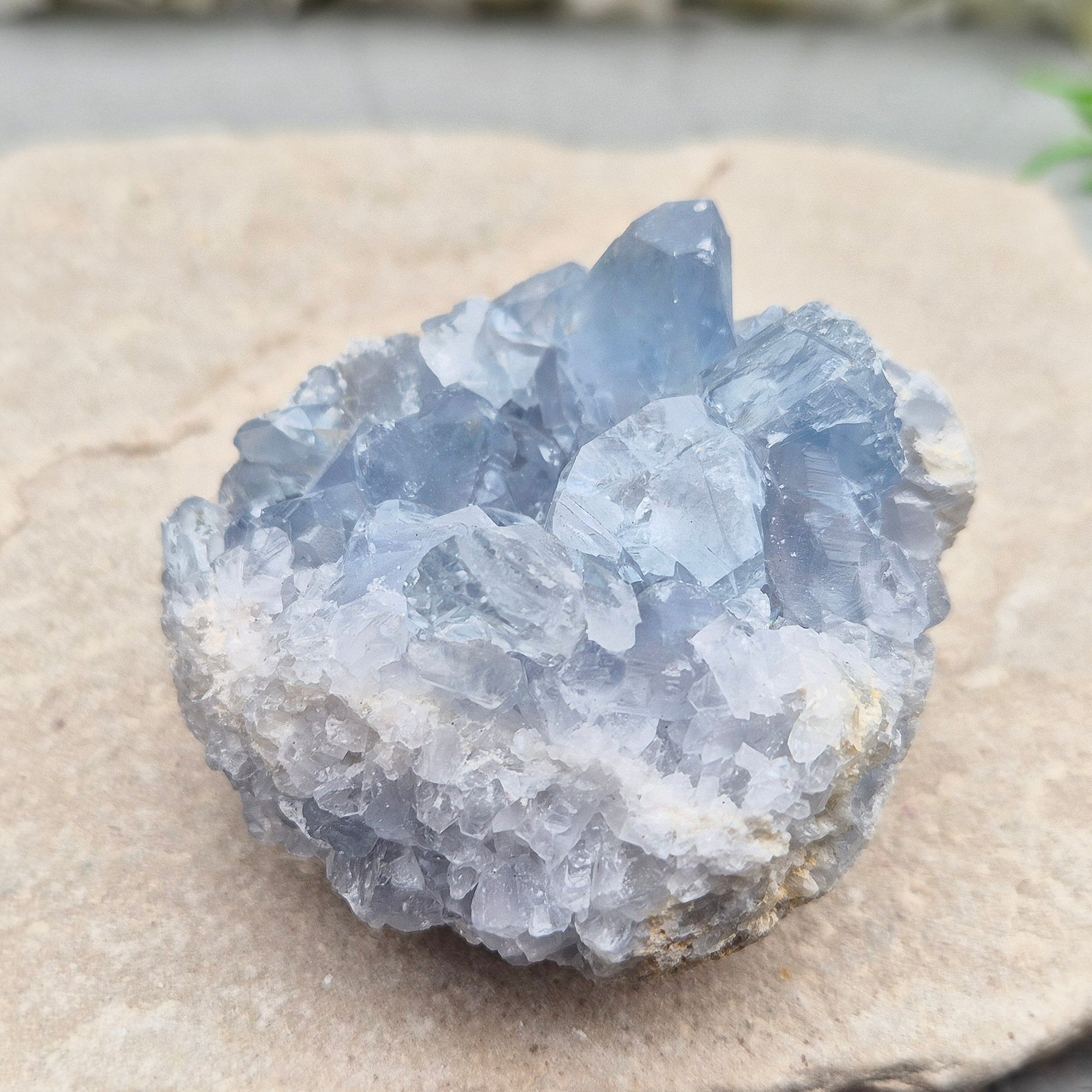 Celestite Crystal Cluster from Madagascar. This beautiful cluster features sparkling sky-blue crystals on a natural matrix. 