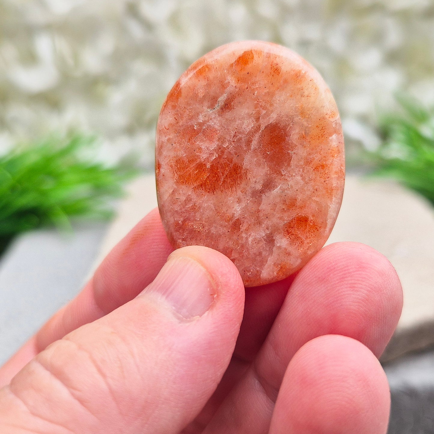 This beautiful flat Sunstone crystal palm stone features warm, peachy-orange tones and a soft, natural shimmer. Sunstone is known for its radiant, positive energy that rekindles your sense of joy, strength, and personal power. 