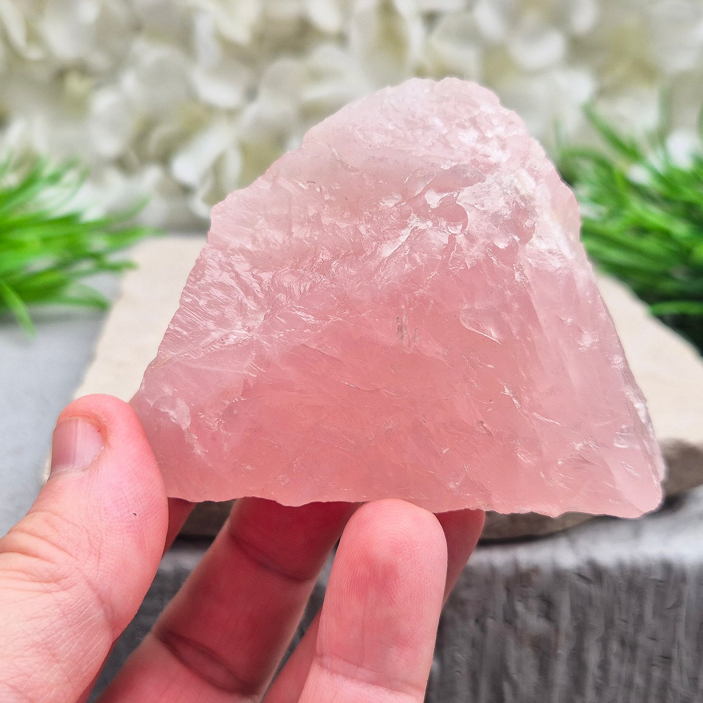This Rose Quartz platform from South Africa is a versatile piece, with one side left natural and the other cut flat. 