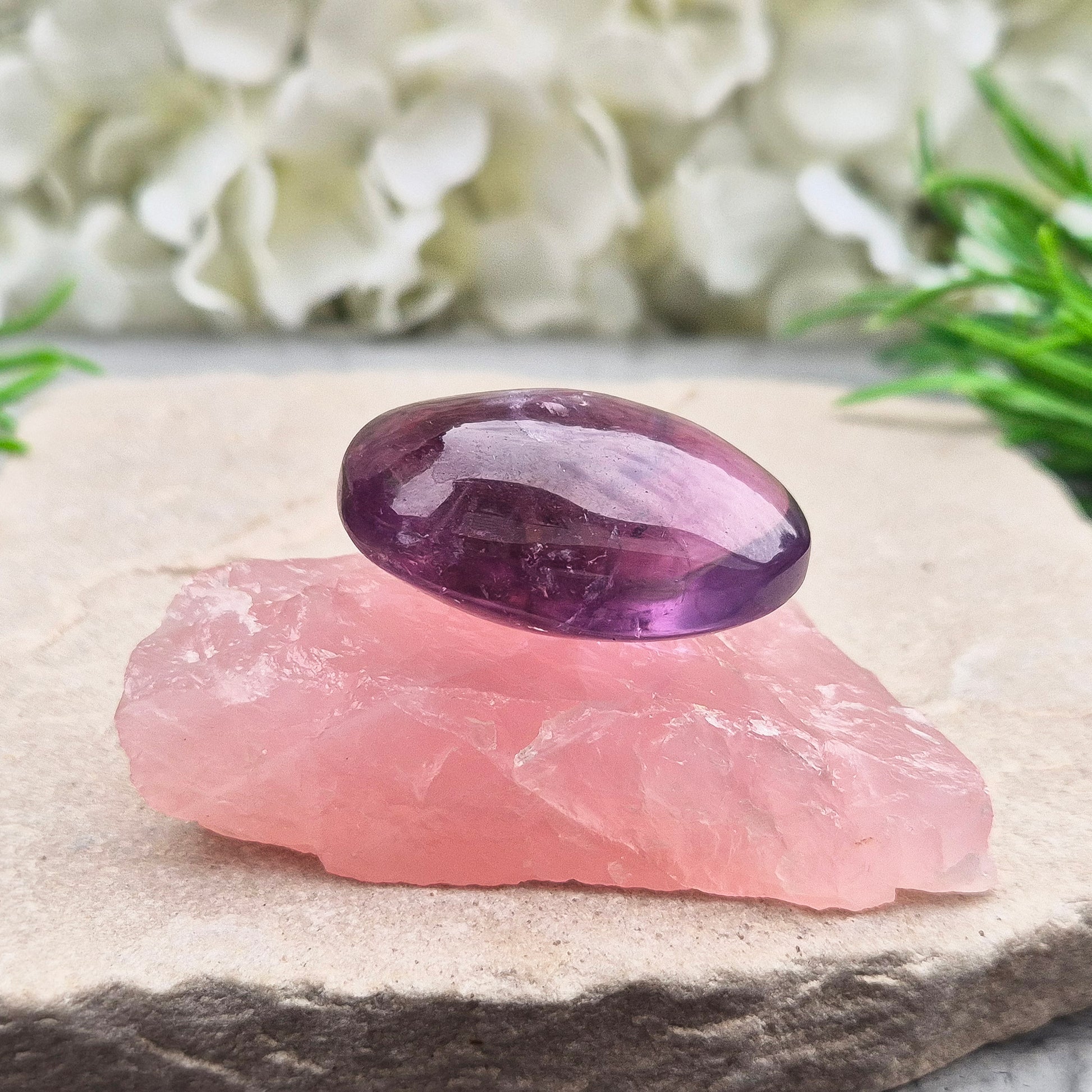 This Rose Quartz platform from South Africa is a versatile piece, with one side left natural and the other cut flat. 