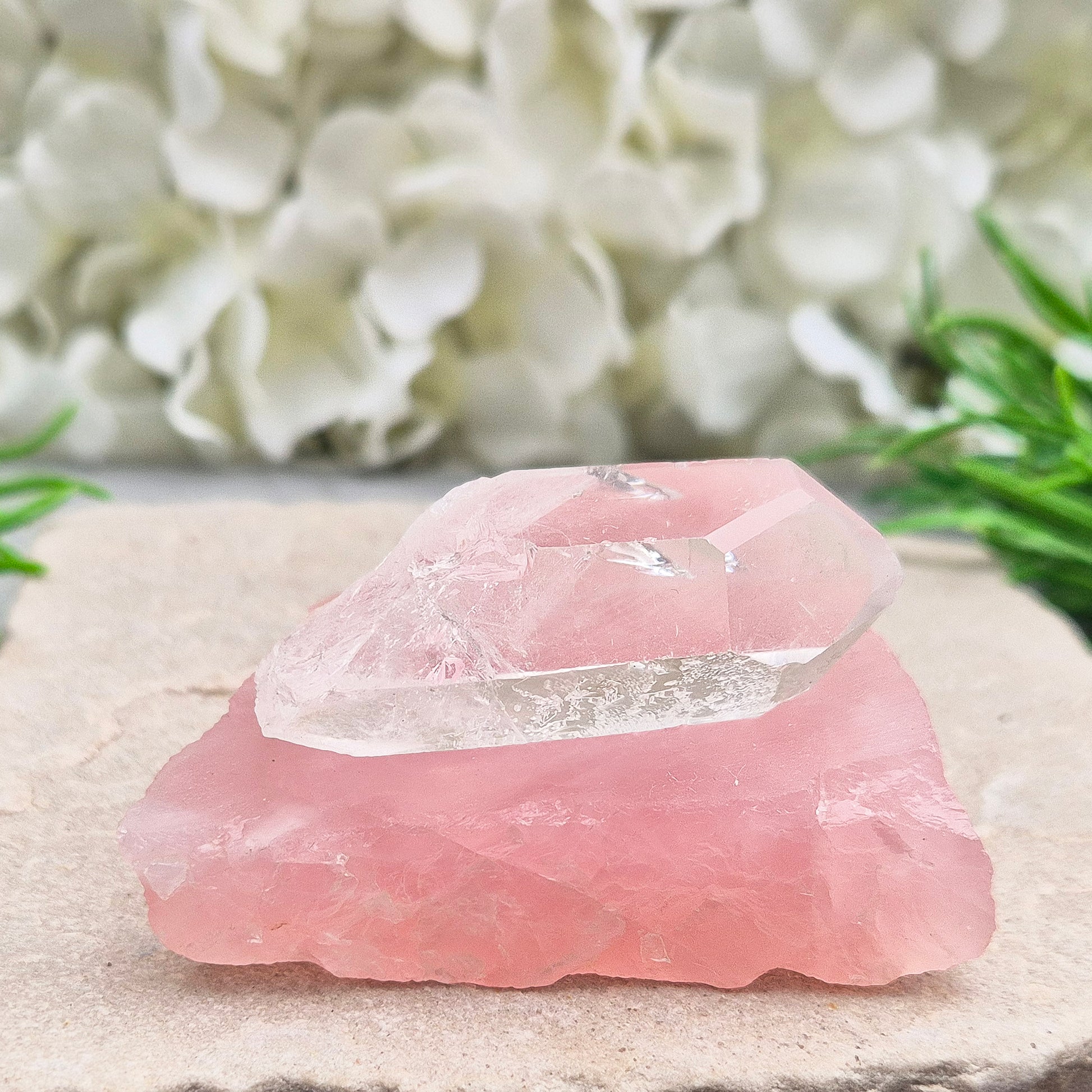 This Rose Quartz platform from South Africa is a versatile piece, with one side left natural and the other cut flat. 