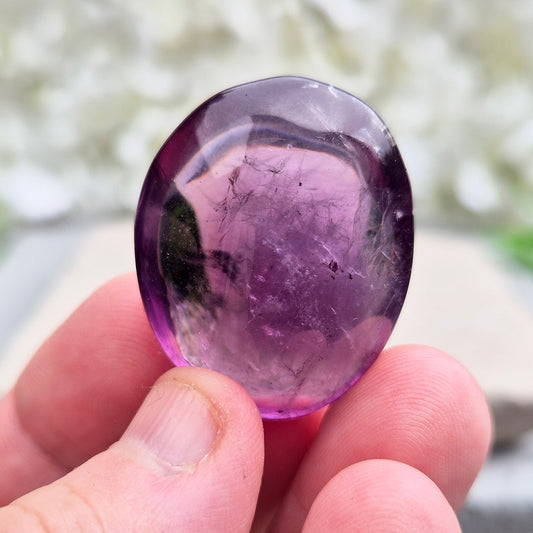 This polished Amethyst Crystal Palm Stone has a rich, smoky purple colour that’s comforting to hold. It helps you feel grounded, peaceful, and centred, offering support for emotional balance and spiritual connection.