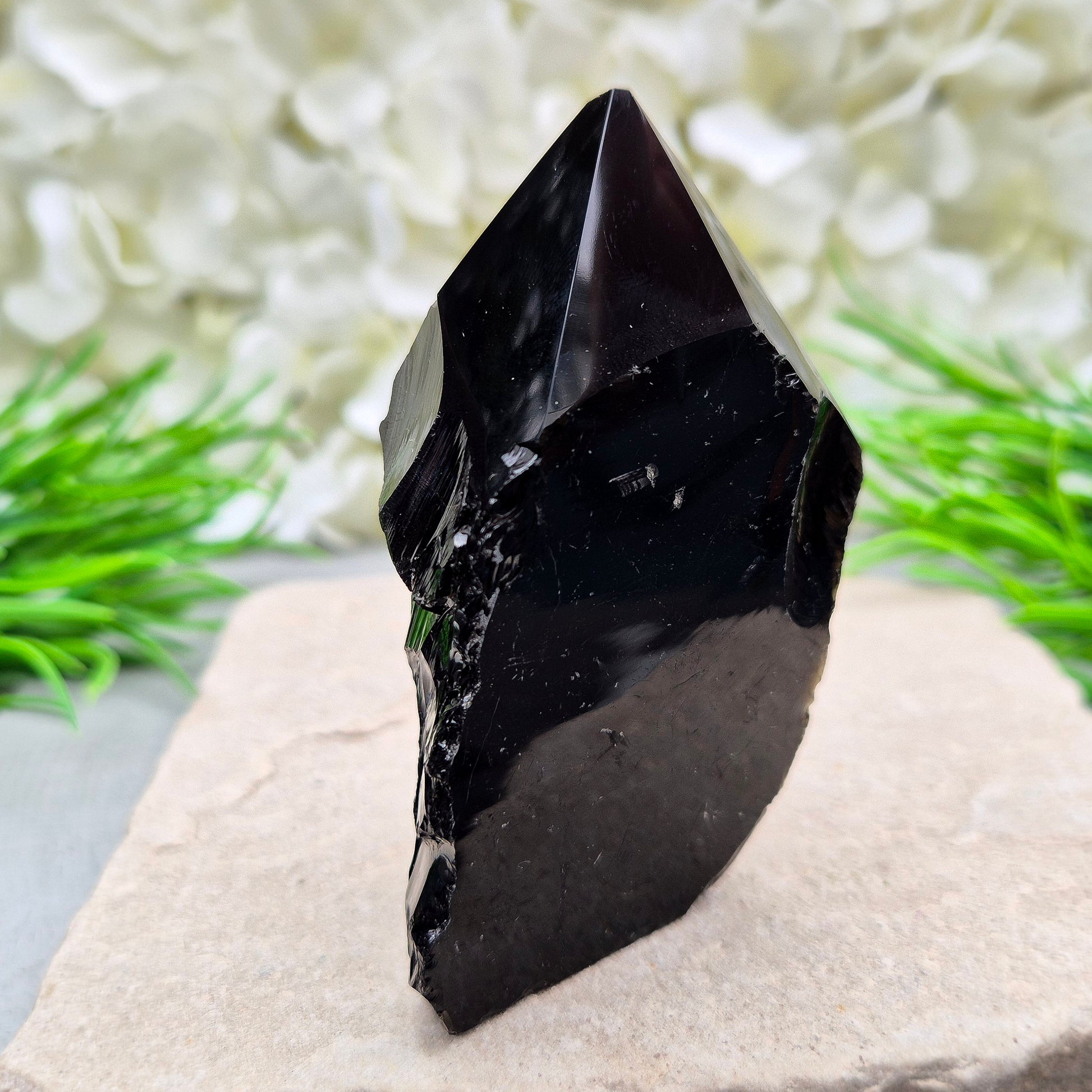 Black Obsidian Standing Point from Mexico. Polished 6 sided generator tip, natural sides and cut base. Its presence encourages clarity and focus, helping you stay centred while connecting with your inner guidance. 