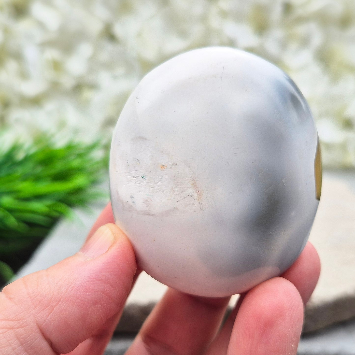 Orca Agate Crystal Pebble. This beautiful Orca Agate crystal, also known as Grey Agate, comes from Madagascar and is named after the Orca whale. It has striking brown/grey and white patterning and colouring. 