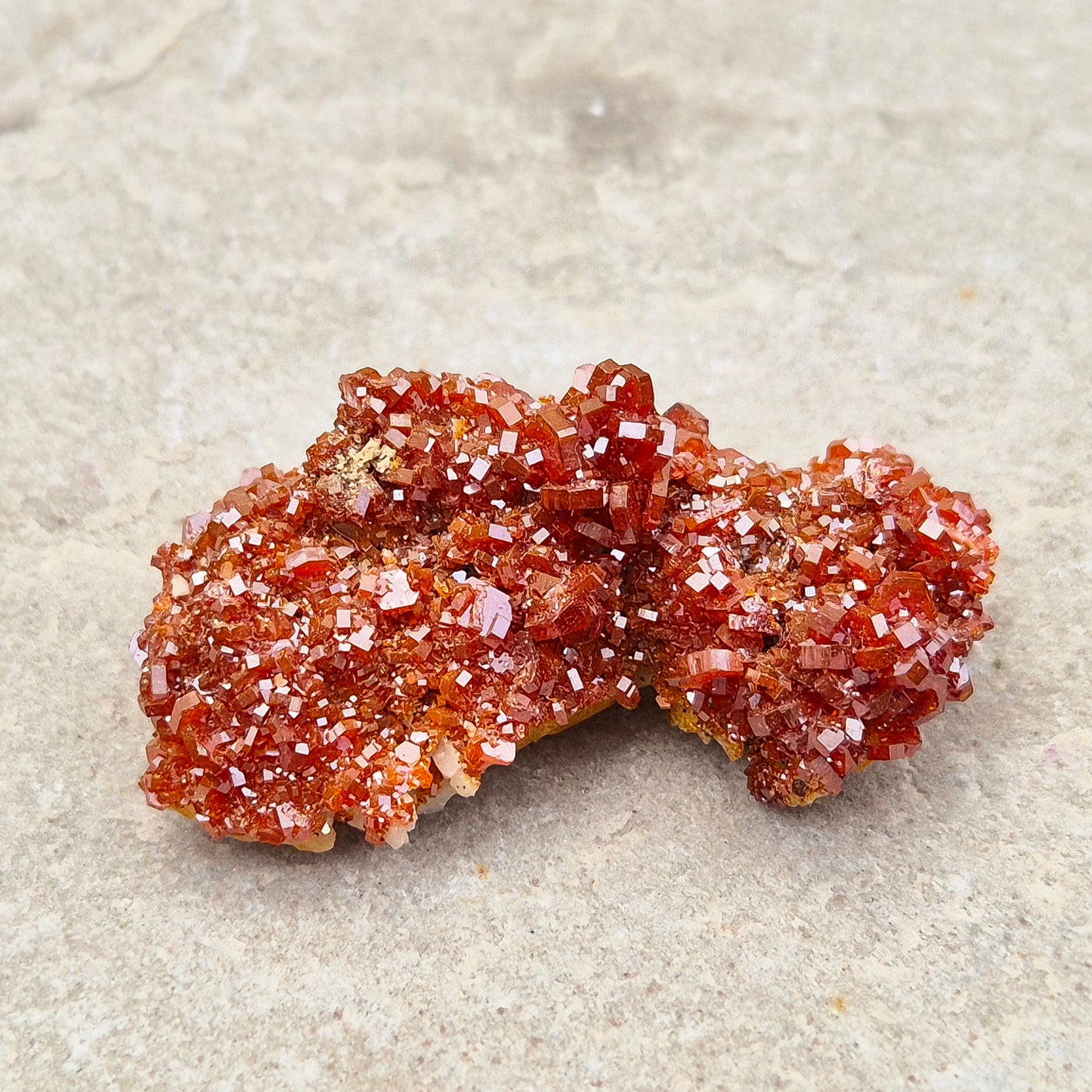 Vanadinite (Vanadite) on Baryte Crystal Cluster. This sparkling cluster from Morocco features fiery red-orange Vanadinite crystals naturally formed on a pale golden Baryte base. 