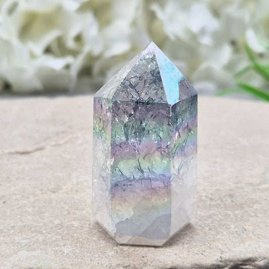 Aura Fire and Ice Quartz Polished Standing Point. Formed through the rapid heating and cooling of Quartz to create internal fracturing, then bonded with Silver and Platinum to become Angel Aura Fire and Ice, this piece radiates pure, high-frequency energy. 
