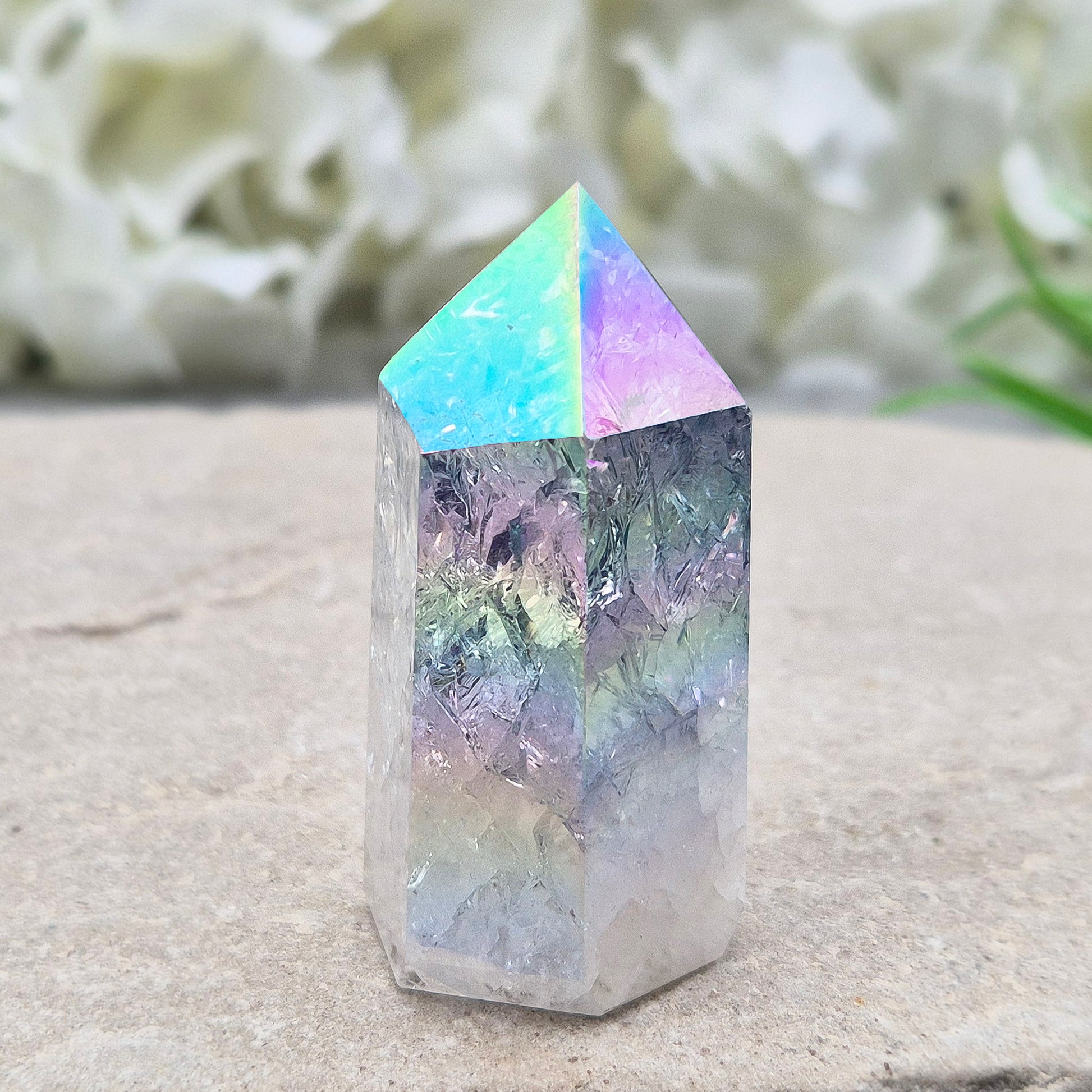Aura Fire and Ice Quartz Polished Standing Point. Formed through the rapid heating and cooling of Quartz to create internal fracturing, then bonded with Silver and Platinum to become Angel Aura Fire and Ice, this piece radiates pure, high-frequency energy. 