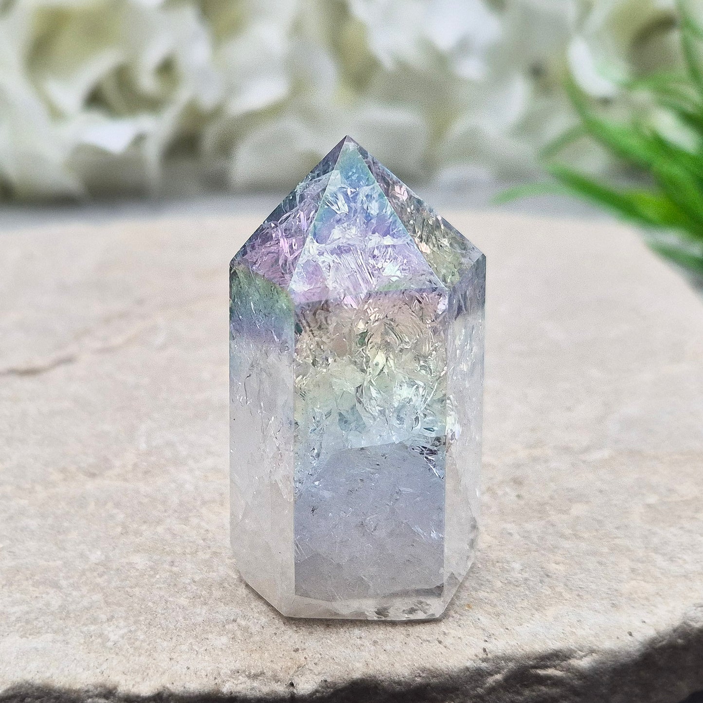 Aura Fire and Ice Quartz Polished Standing Point. Formed through the rapid heating and cooling of Quartz to create internal fracturing, then bonded with Silver and Platinum to become Angel Aura Fire and Ice, this piece radiates pure, high-frequency energy. 