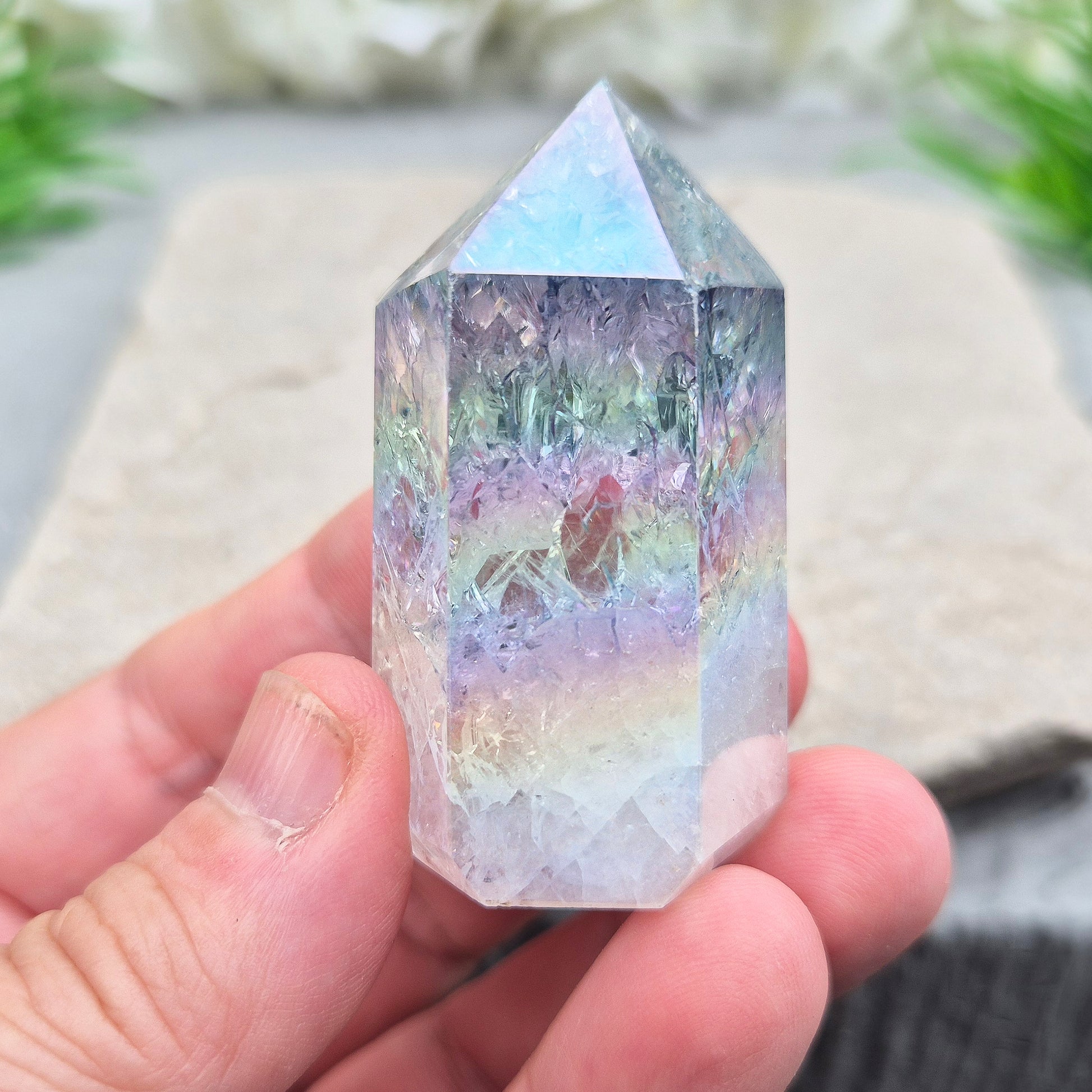 Aura Fire and Ice Quartz Polished Standing Point. Formed through the rapid heating and cooling of Quartz to create internal fracturing, then bonded with Silver and Platinum to become Angel Aura Fire and Ice, this piece radiates pure, high-frequency energy. 