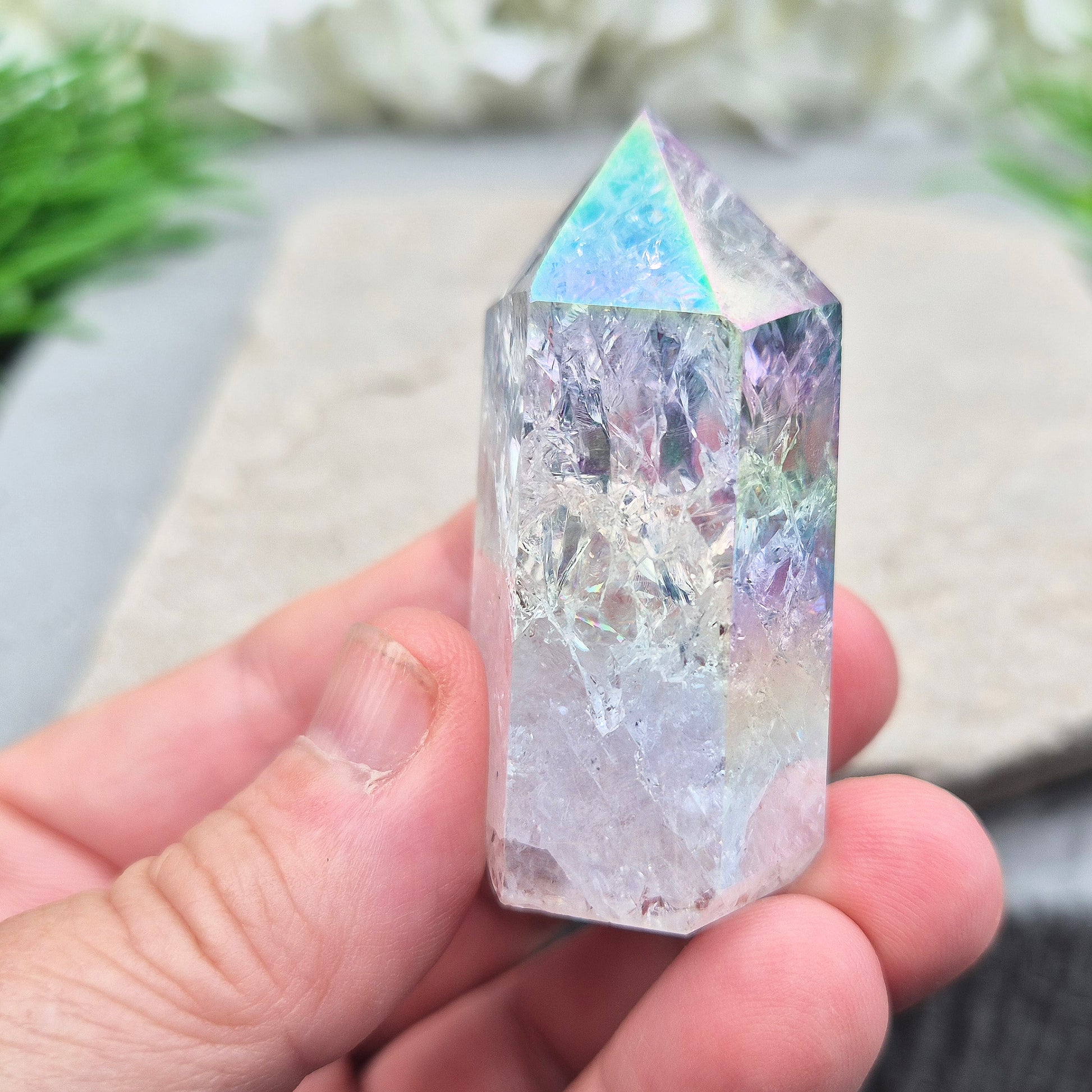 Aura Fire and Ice Quartz Polished Standing Point. Formed through the rapid heating and cooling of Quartz to create internal fracturing, then bonded with Silver and Platinum to become Angel Aura Fire and Ice, this piece radiates pure, high-frequency energy. 