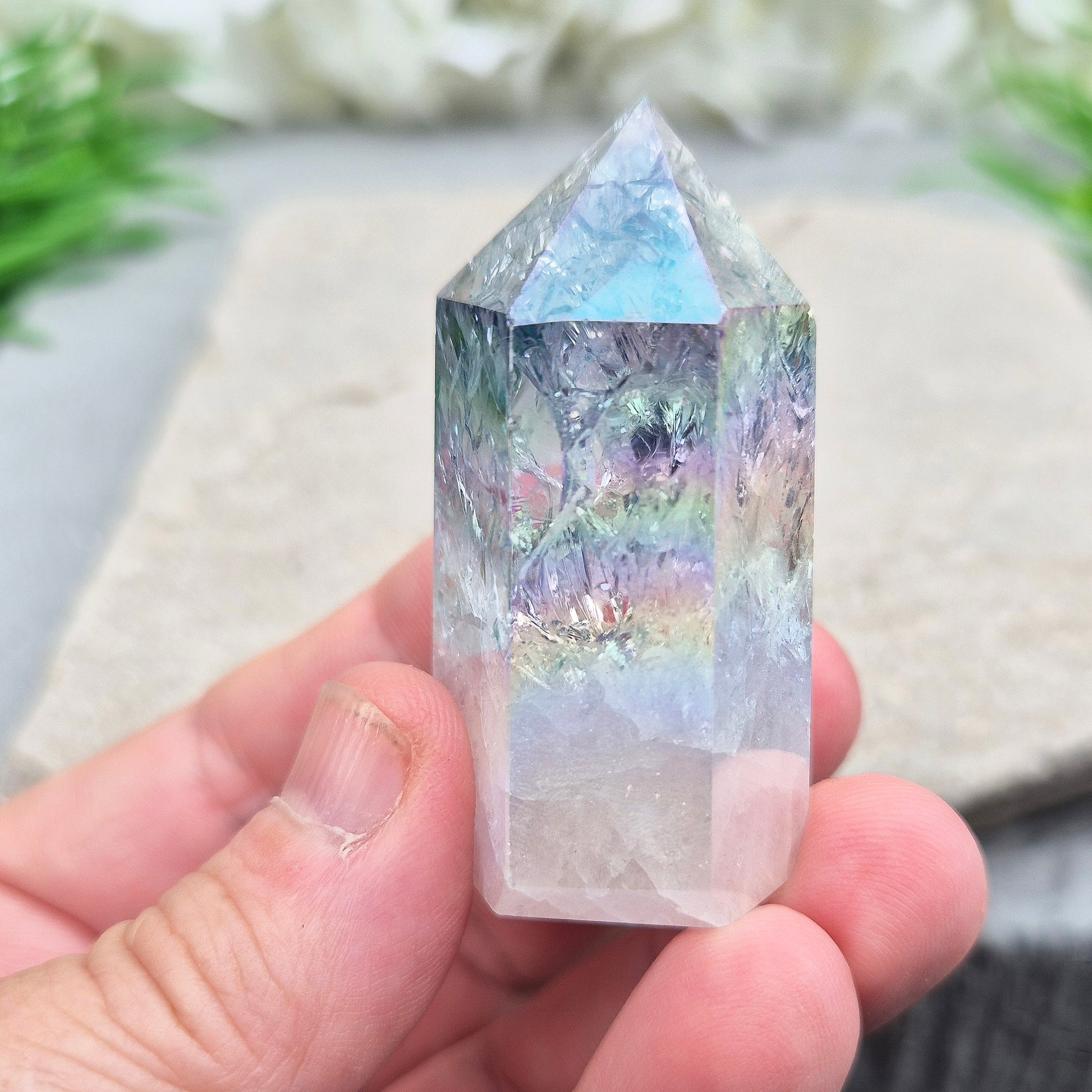 Aura Fire and Ice Quartz Polished Standing Point. Formed through the rapid heating and cooling of Quartz to create internal fracturing, then bonded with Silver and Platinum to become Angel Aura Fire and Ice, this piece radiates pure, high-frequency energy. 