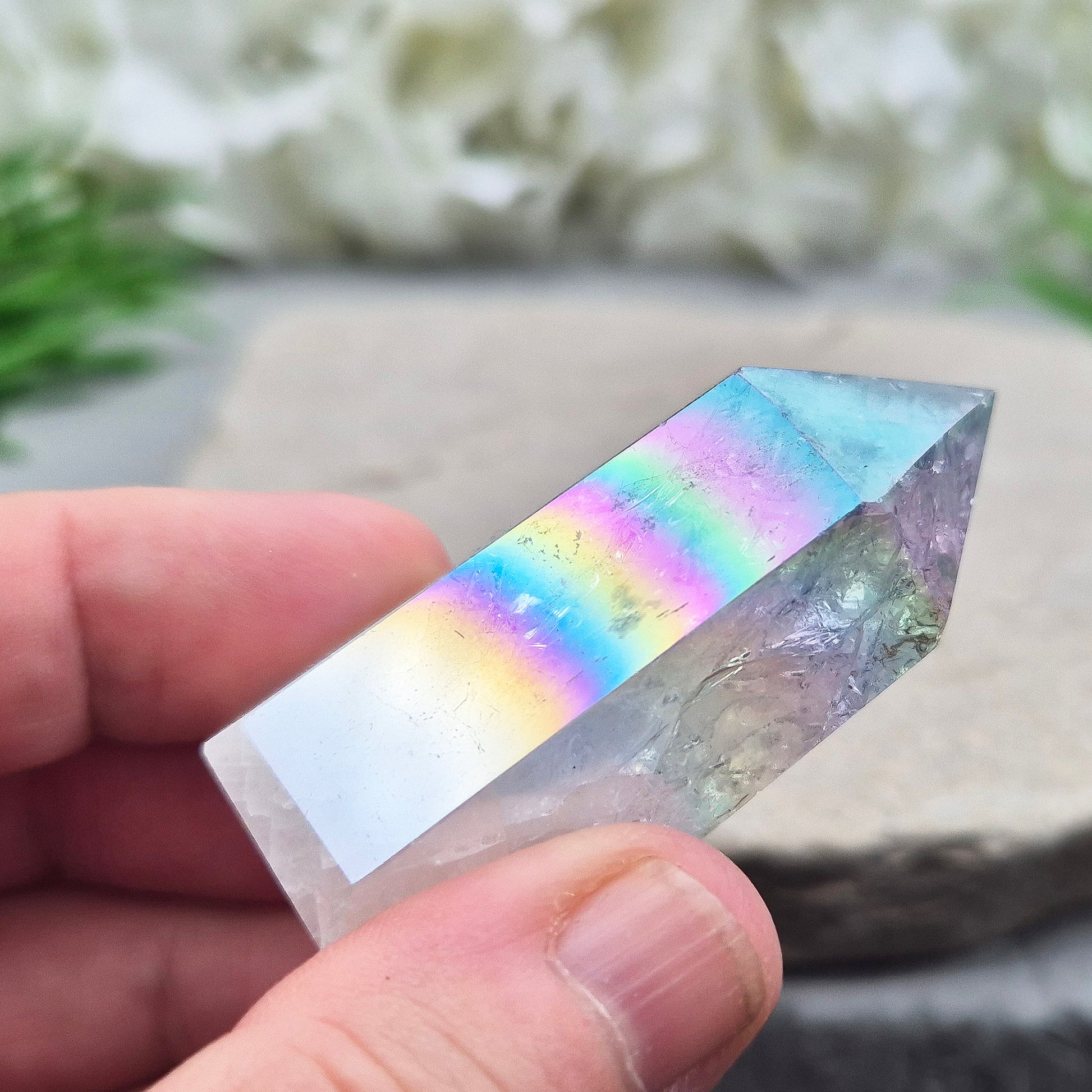 Aura Fire and Ice Quartz Polished Standing Point. Formed through the rapid heating and cooling of Quartz to create internal fracturing, then bonded with Silver and Platinum to become Angel Aura Fire and Ice, this piece radiates pure, high-frequency energy. 