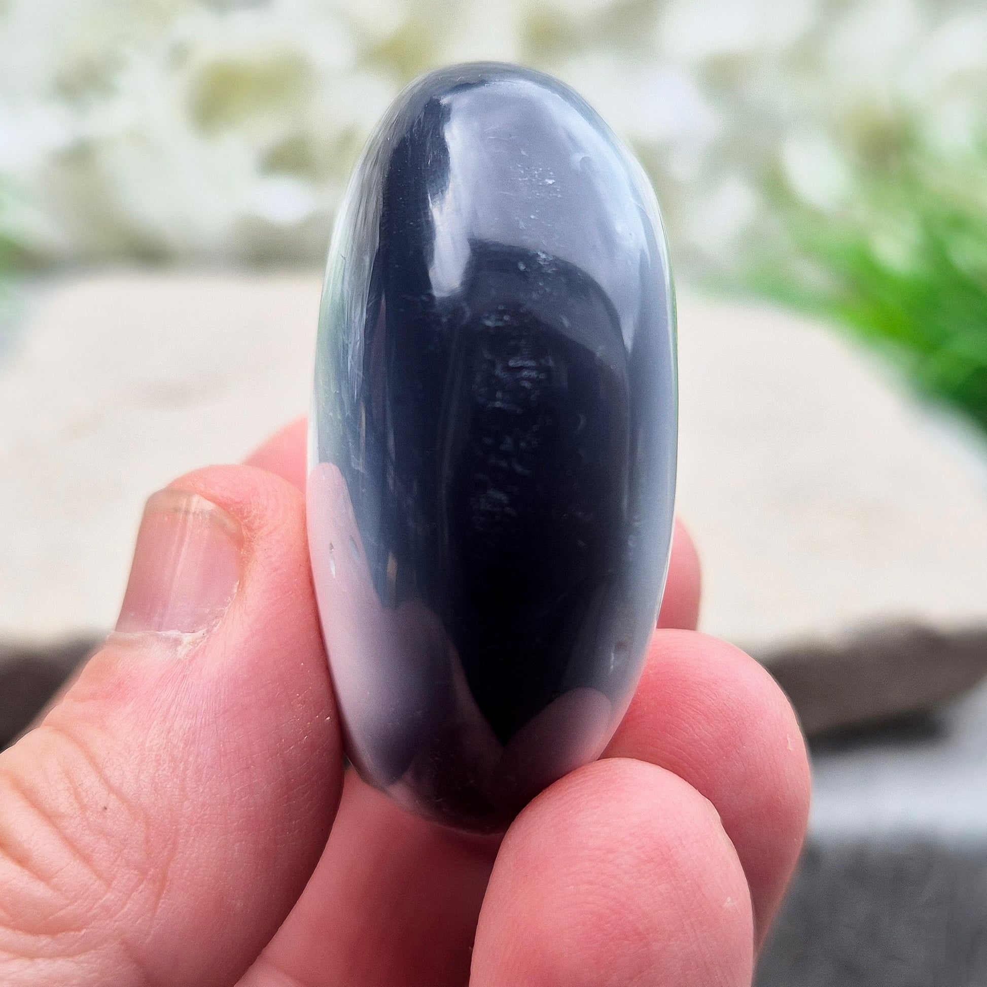 Orca Agate Crystal Pebble. This beautiful Orca Agate crystal, also known as Grey Agate, comes from Madagascar and is named after the Orca whale. It has striking dark grey and white patterning and colouring. 