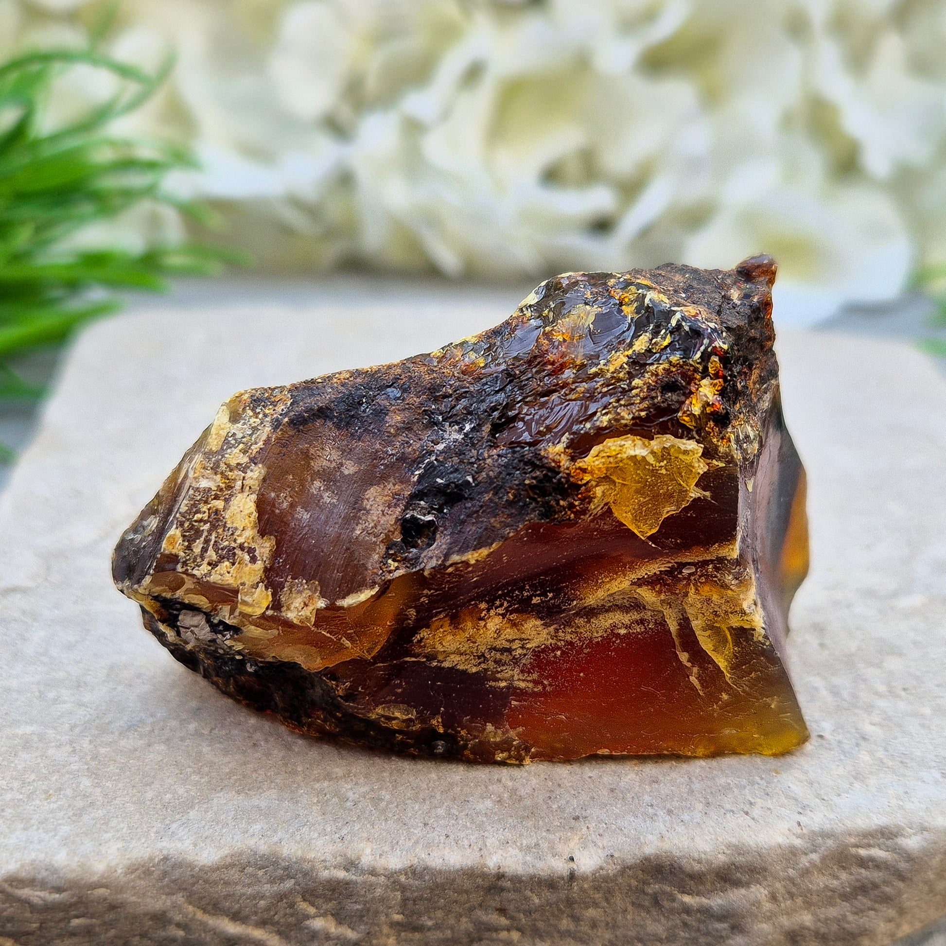 Rare Blue Amber from the Dominican Republic with stunning blue fluorescence. A unique fossil resin offering uplifting, calming energy support.