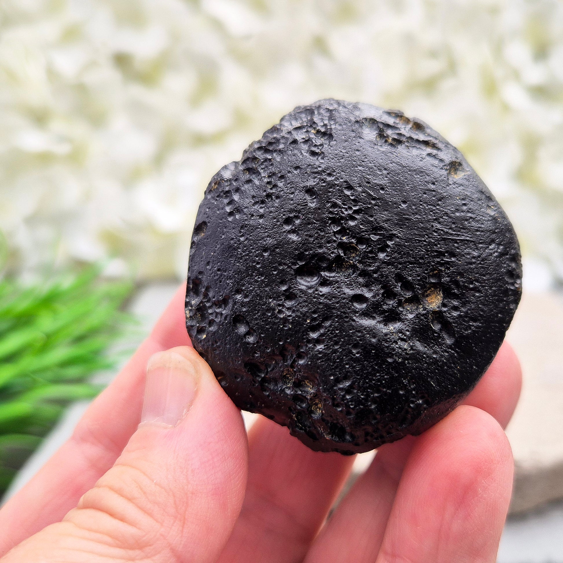 Natural Black Tektite — a protective, grounding crystal to support meditation, spiritual growth, and energetic balance.
