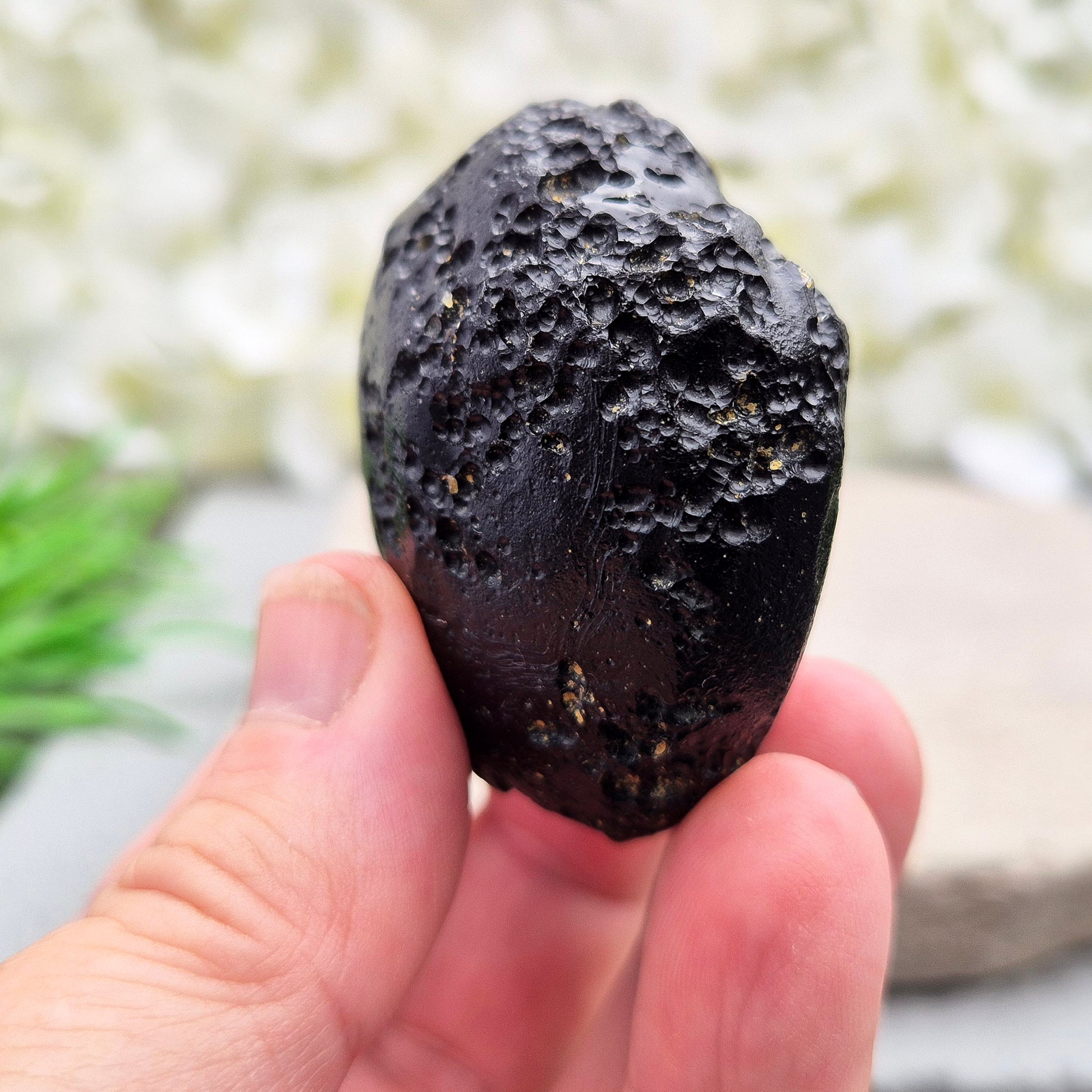 Natural Black Tektite — a protective, grounding crystal to support meditation, spiritual growth, and energetic balance.