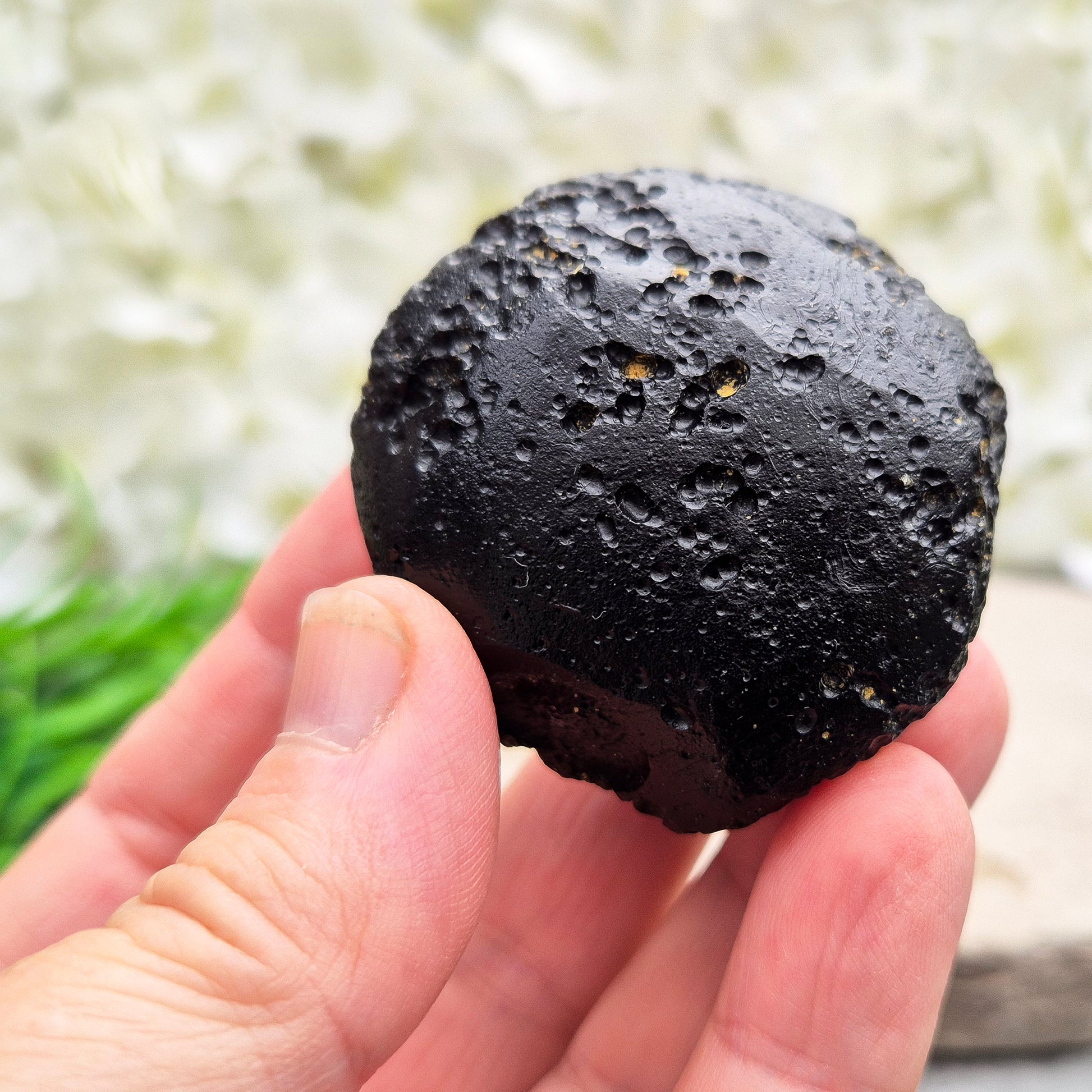 Natural Black Tektite — a protective, grounding crystal to support meditation, spiritual growth, and energetic balance.