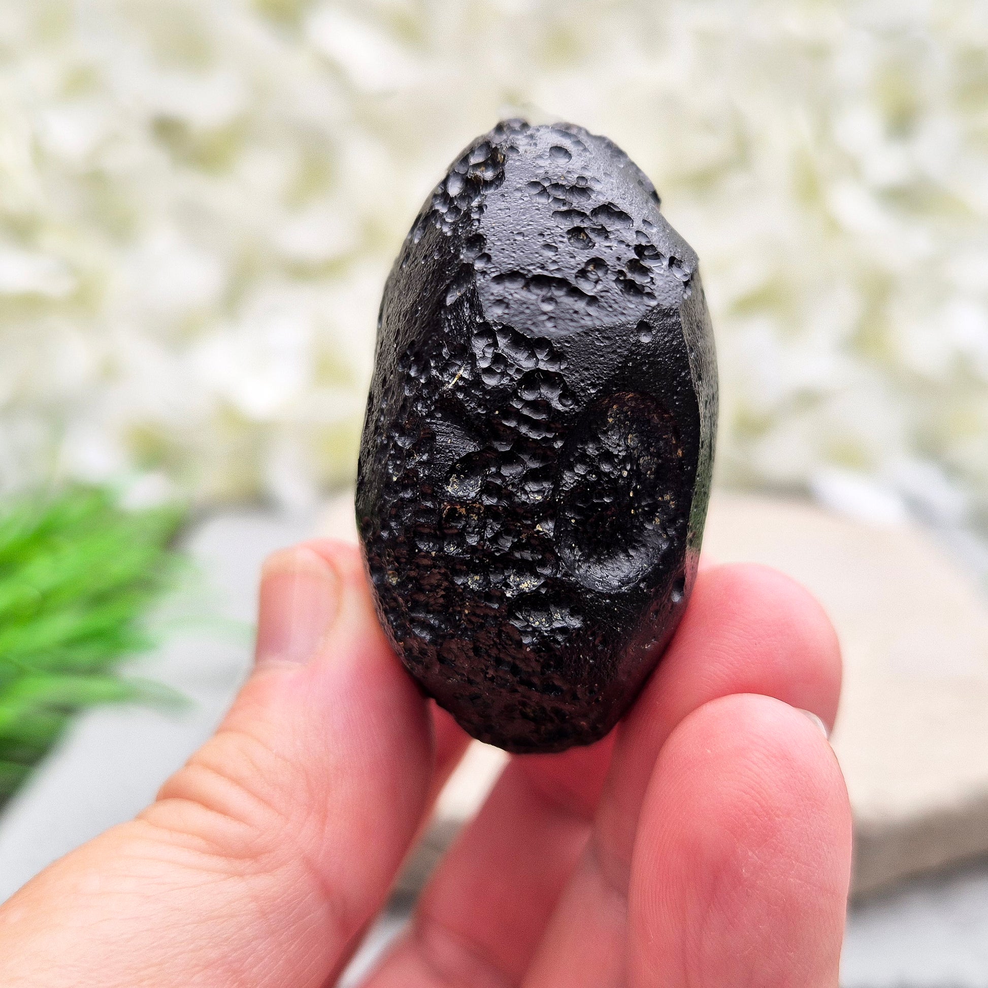 Natural Black Tektite — a protective, grounding crystal to support meditation, spiritual growth, and energetic balance.