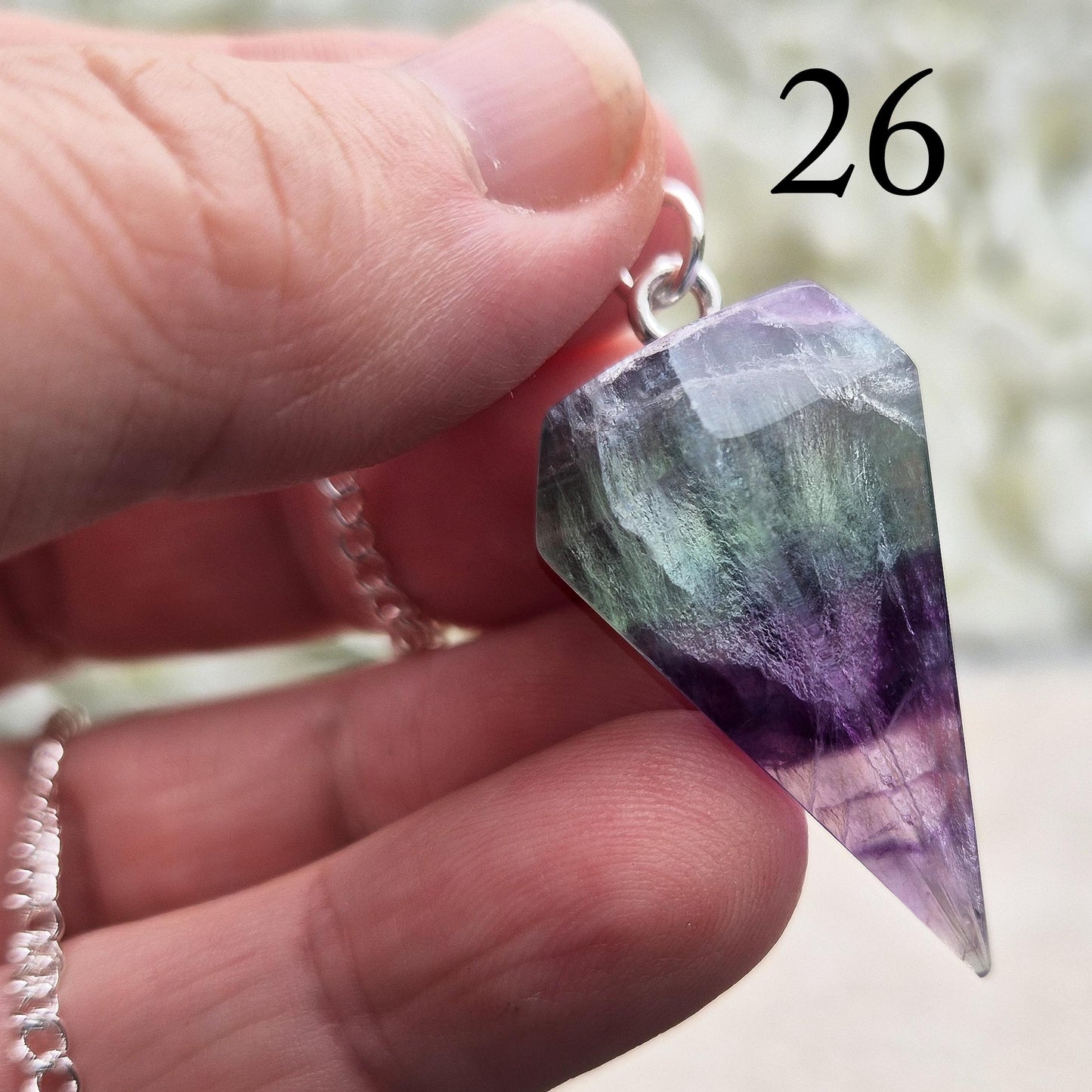 Fluorite Crystal Pendulum, Rainbow Fluorite Dowser. Will come in a organza pouch to keep it in.