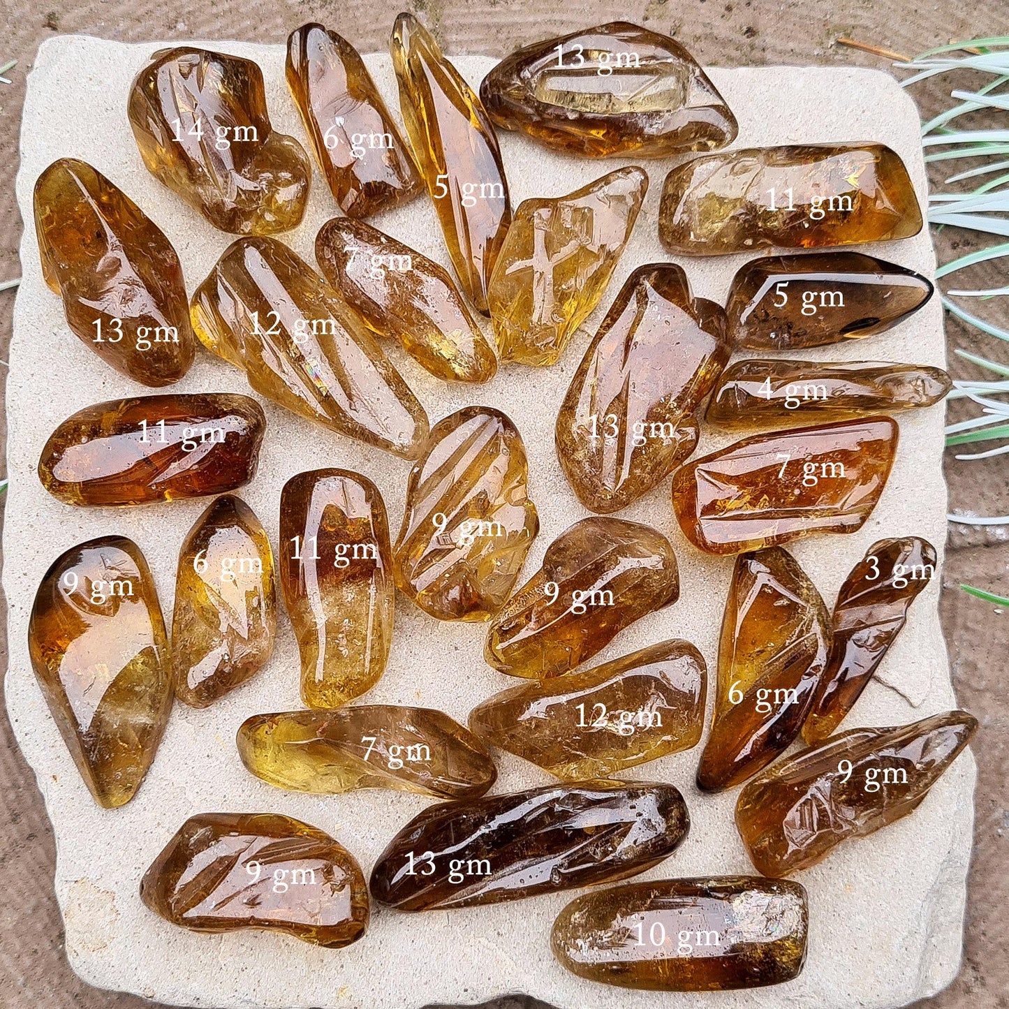 These genuine, untreated citrine crystals show a warm, dark honey colour, lightly polished only to preserve their natural surface. Sourced from South Africa
