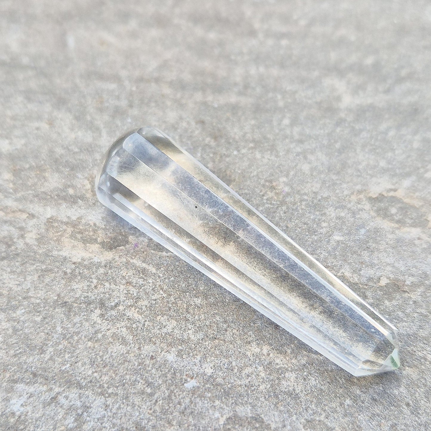 Vogel Quartz Crystal Wand with 12 sides, pointed tip, and rounded base. Designed to focus and direct energy with precision