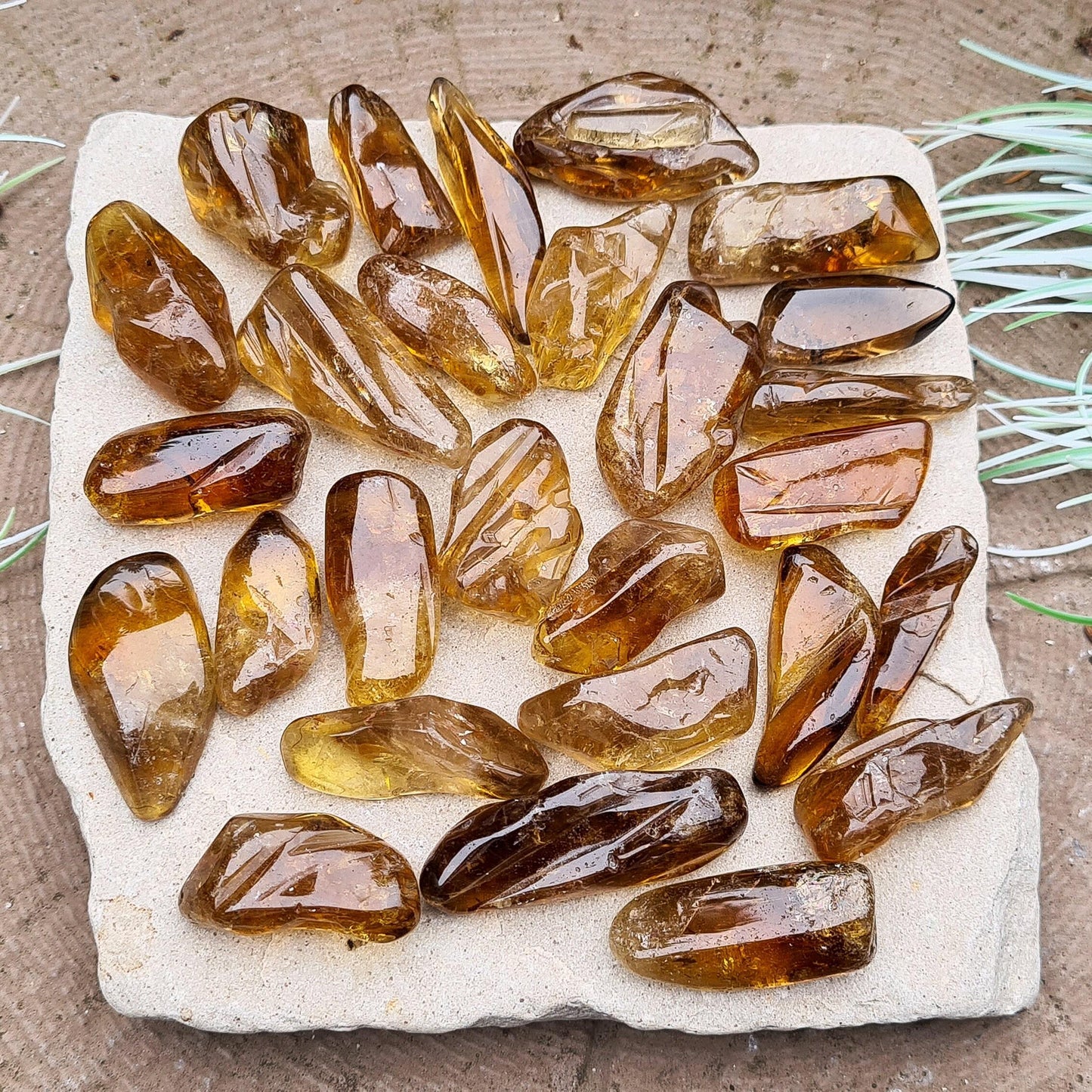 These genuine, untreated citrine crystals show a warm, dark honey colour, lightly polished only to preserve their natural surface. Sourced from South Africa