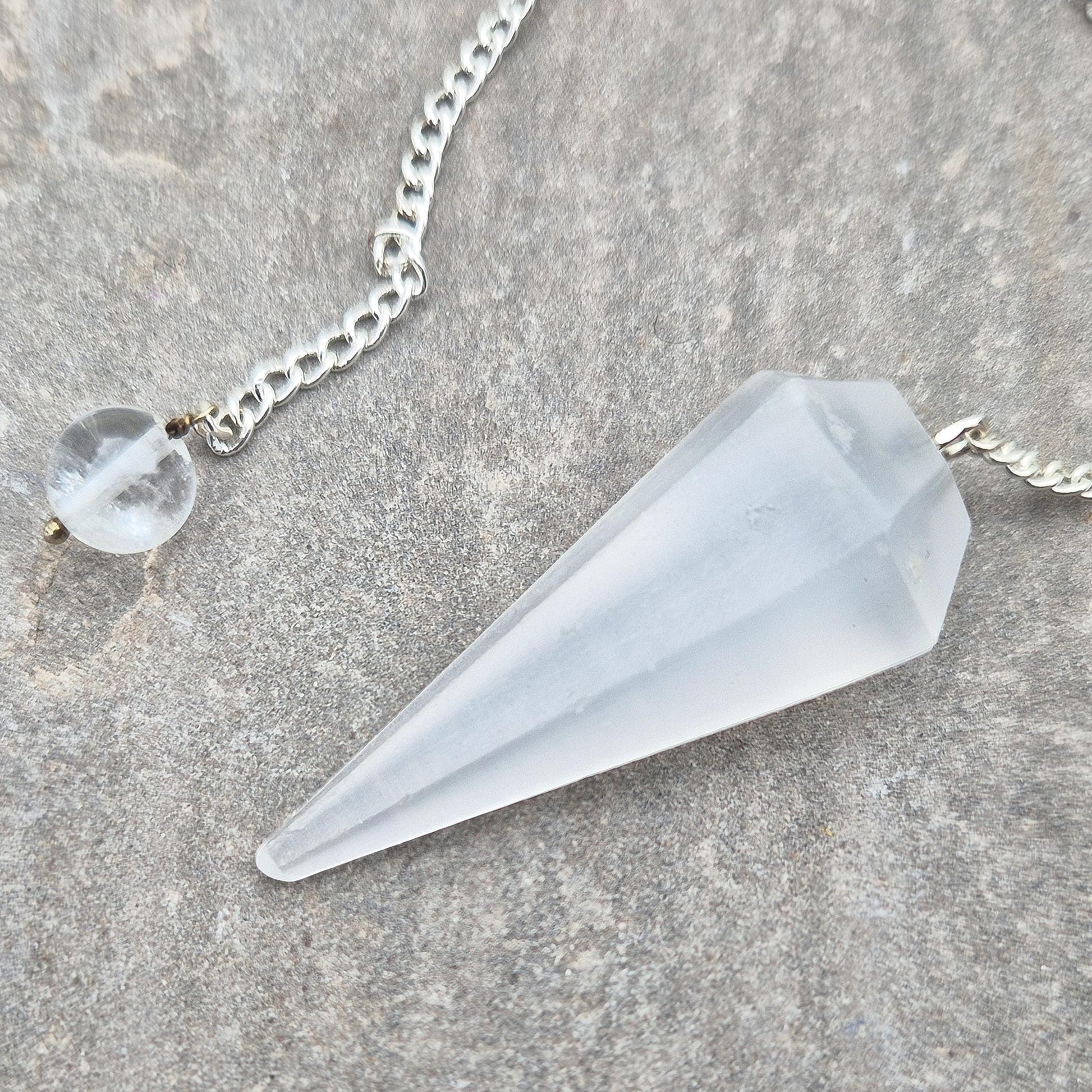 Selenite pendulum — a calming tool for dowsing, energy work, and meditation. Supports clarity and cleansing with gentle lunar energy. Enhance your divination.