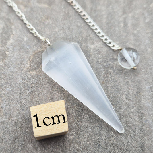 Selenite pendulum — a calming tool for dowsing, energy work, and meditation. Supports clarity and cleansing with gentle lunar energy. Enhance your divination.
