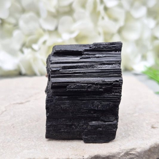 Natural Black Tourmaline with mica. Strong protective crystal that helps you feel safe, calm, clear-minded, and emotionally strong.