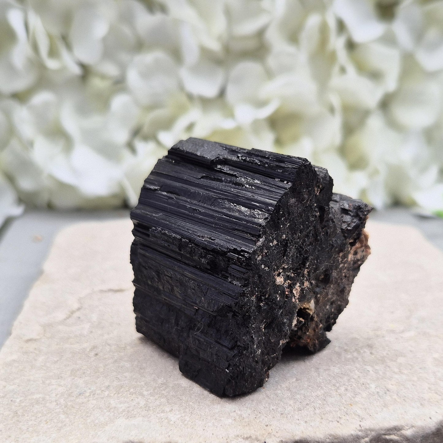 Natural Black Tourmaline with mica. Strong protective crystal that helps you feel safe, calm, clear-minded, and emotionally strong.