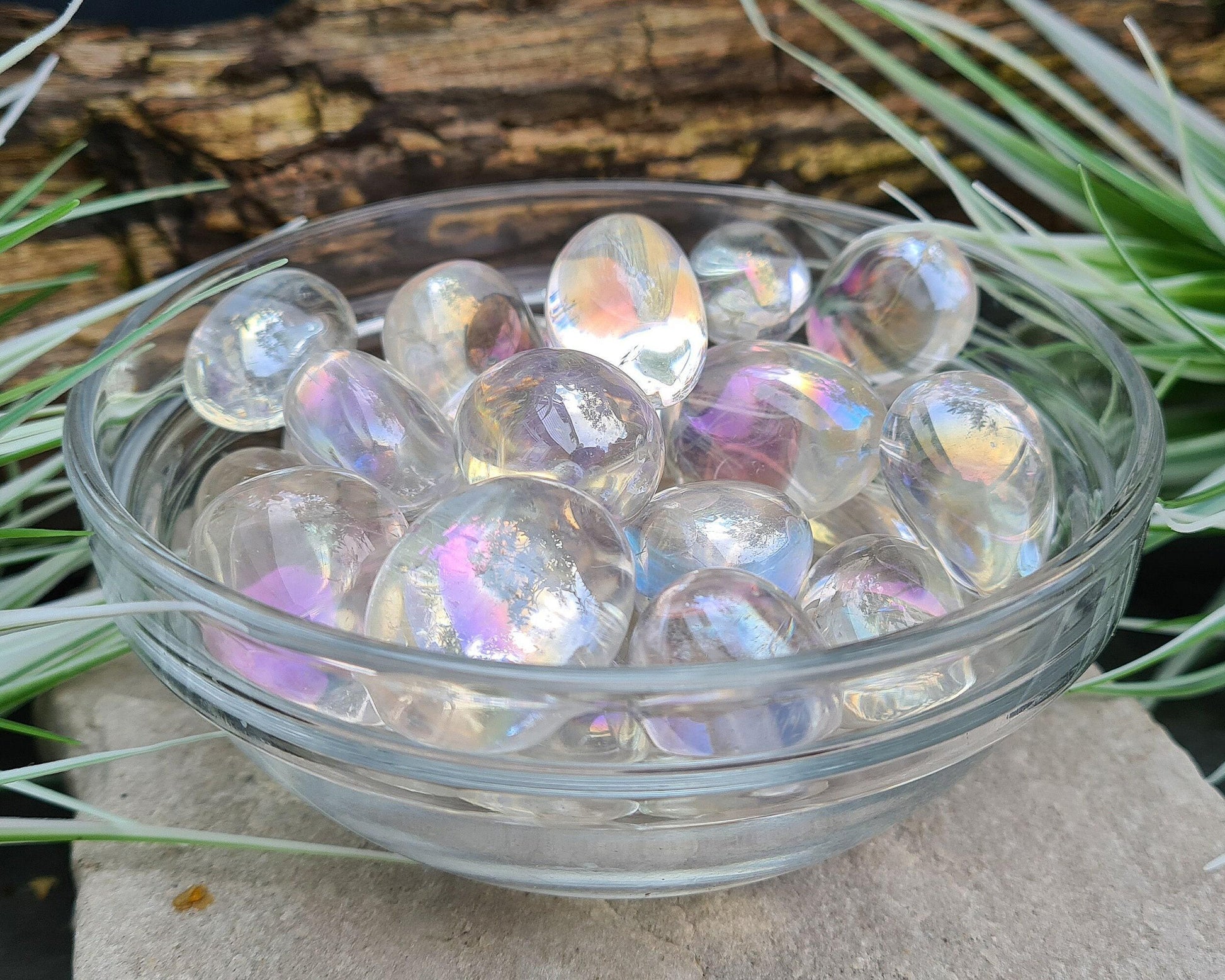Angel Aura Quartz Tumble Stones are powerful energetic crystals that uplift your mood, clear distractions, and bring joy and peace. 