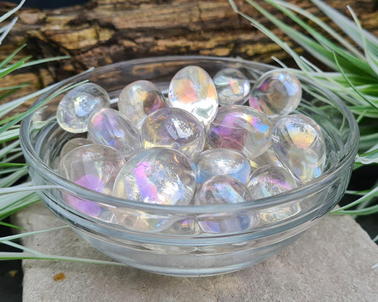 Angel Aura Quartz Tumble Stones are powerful energetic crystals that uplift your mood, clear distractions, and bring joy and peace. 