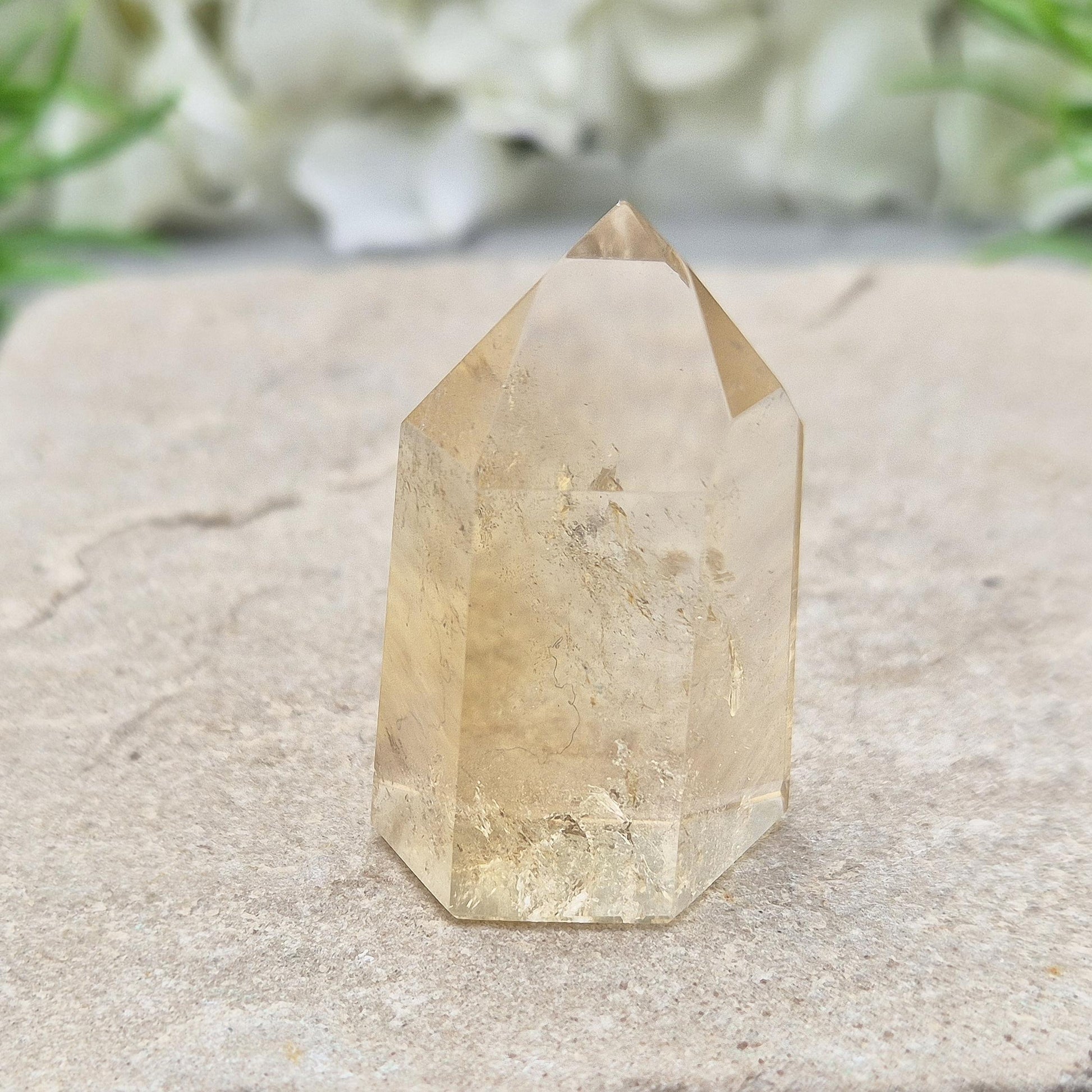 Authentic Brazilian citrine crystal tower with a polished finish. Perfect for display, gifting, or curated crystal spaces.