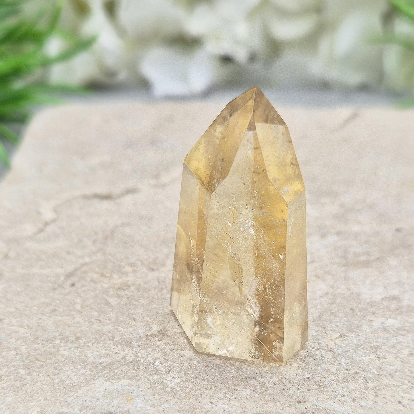 Authentic Brazilian citrine crystal tower with a polished finish. Perfect for display, gifting, or curated crystal spaces.