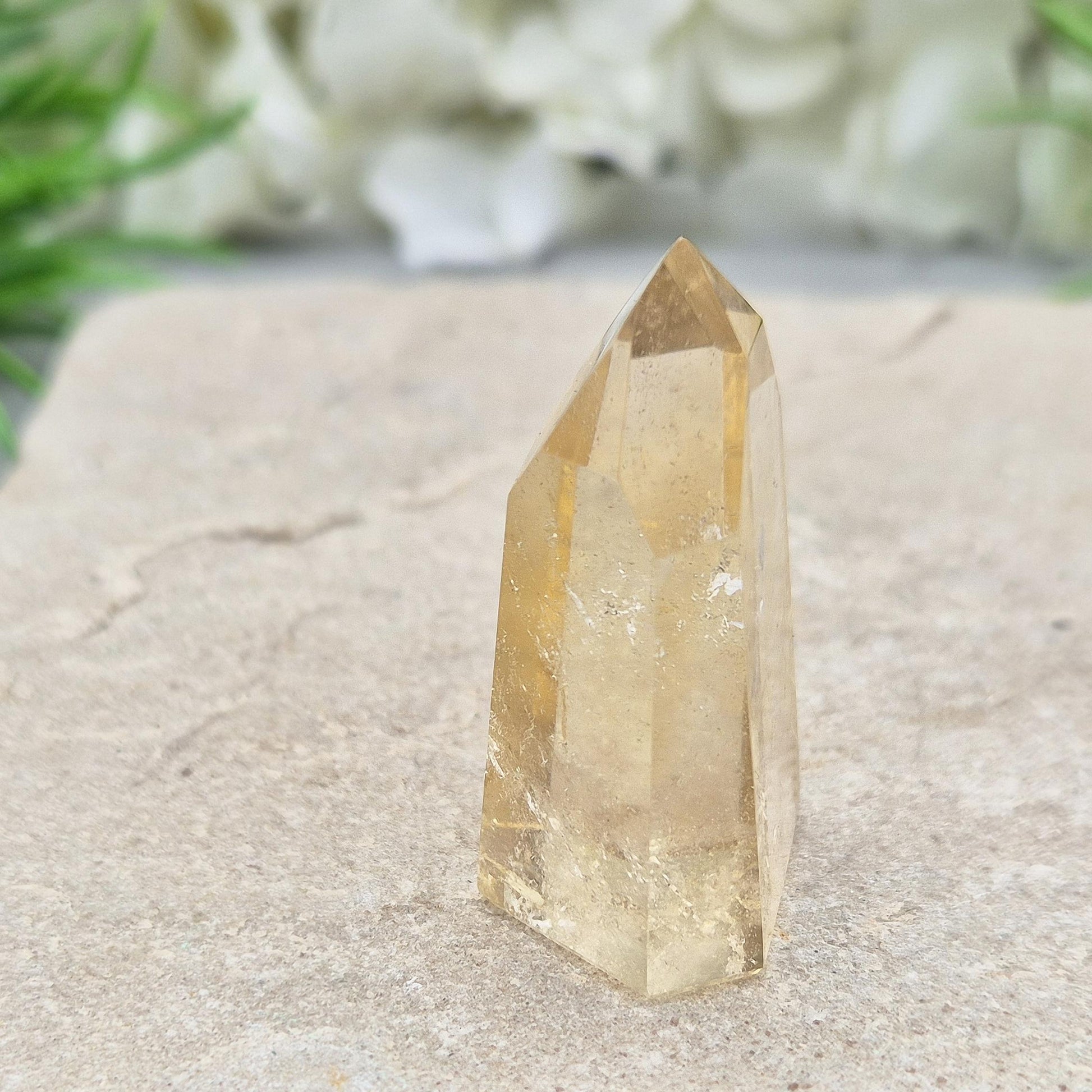 Authentic Brazilian citrine crystal tower with a polished finish. Perfect for display, gifting, or curated crystal spaces.