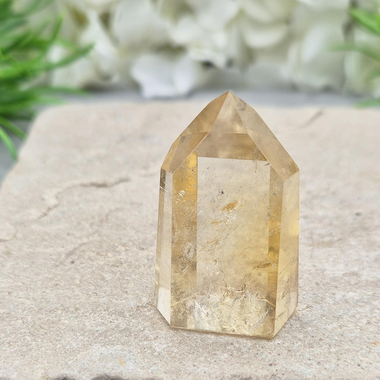 Authentic Brazilian citrine crystal tower with a polished finish. Perfect for display, gifting, or curated crystal spaces.