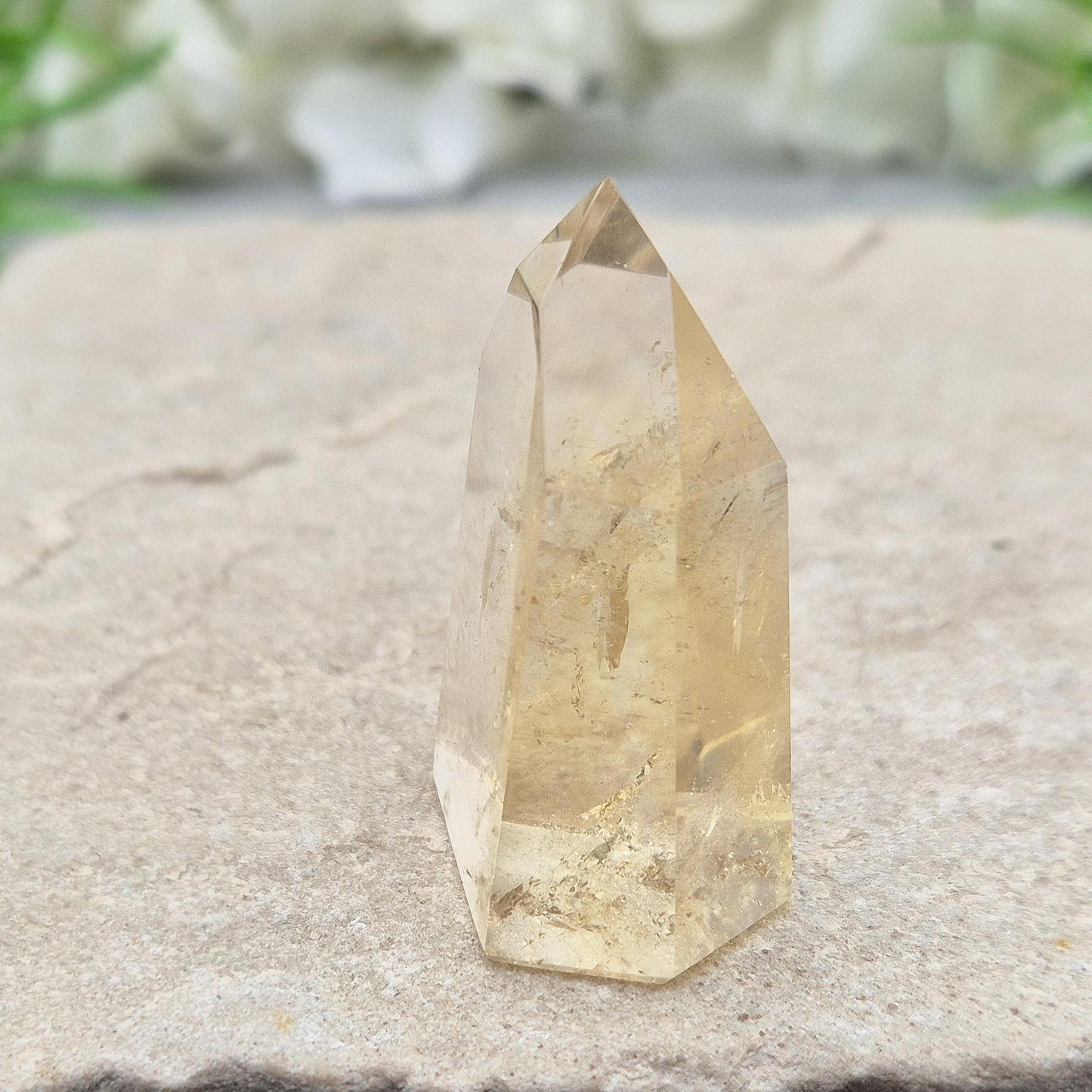 Authentic Brazilian citrine crystal tower with a polished finish. Perfect for display, gifting, or curated crystal spaces.