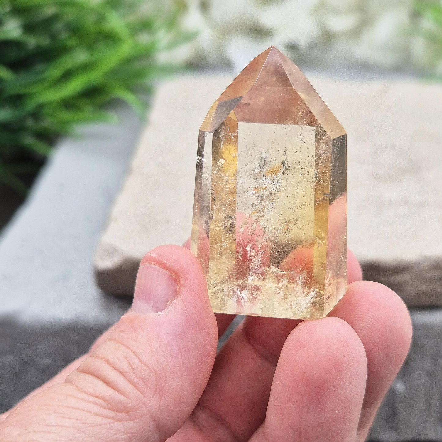 Authentic Brazilian citrine crystal tower with a polished finish. Perfect for display, gifting, or curated crystal spaces.