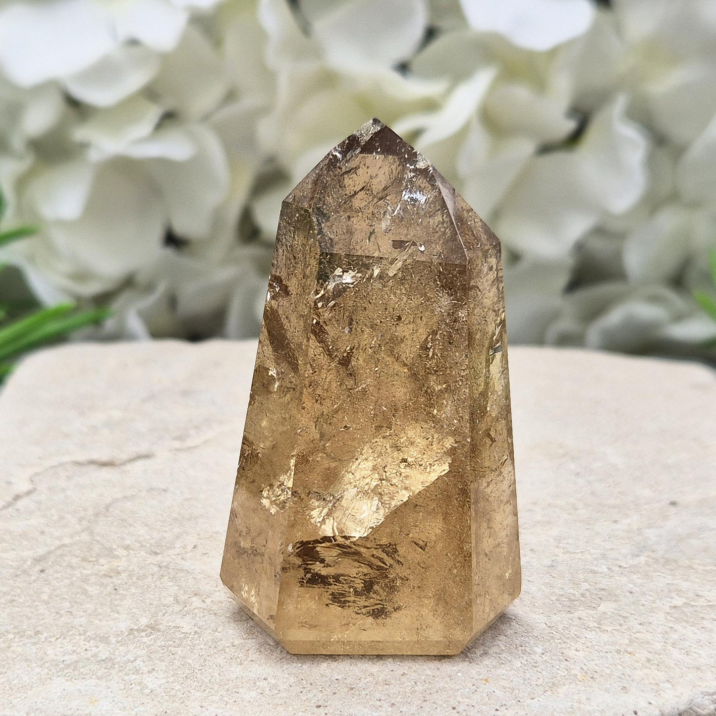natural citrine from Brazil. Ideal crystal for decorating sacred spaces or gifting to crystal enthusiasts. Polished point ideal for your home and workspace.