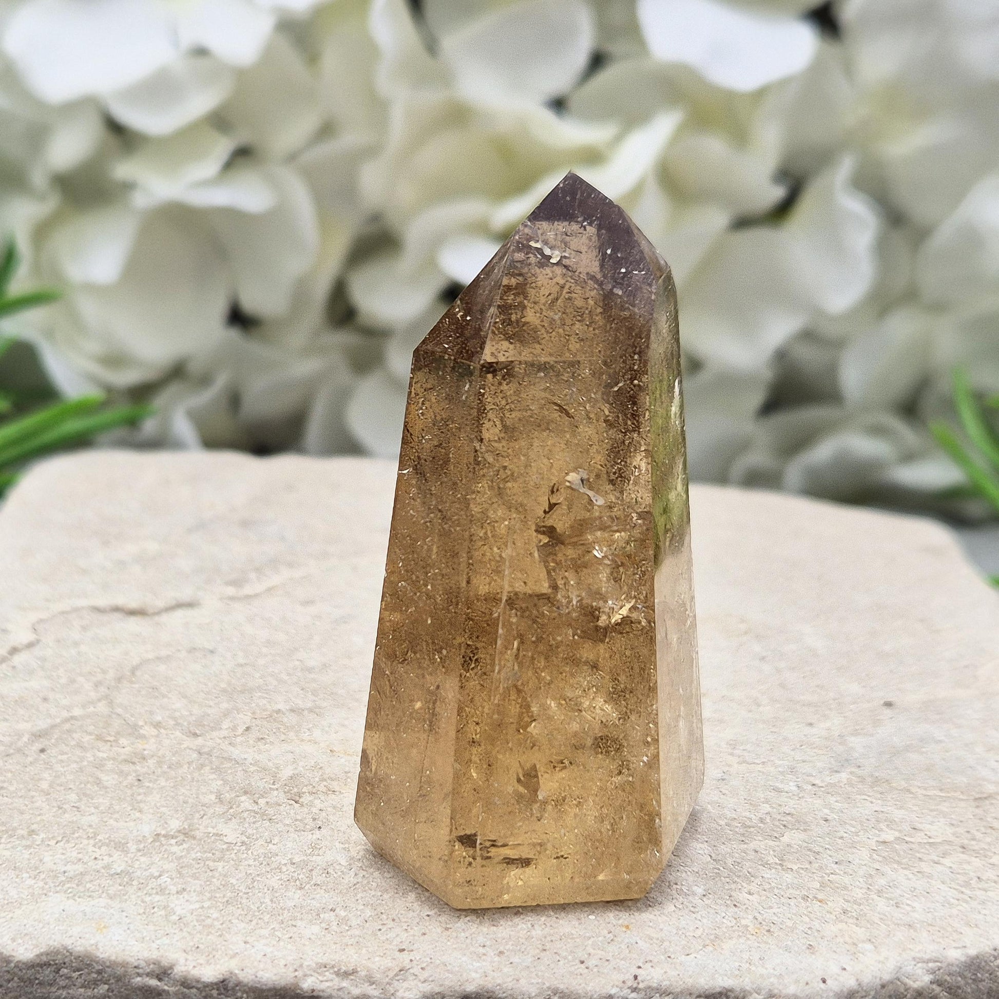 natural citrine from Brazil. Ideal crystal for decorating sacred spaces or gifting to crystal enthusiasts. Polished point ideal for your home and workspace.