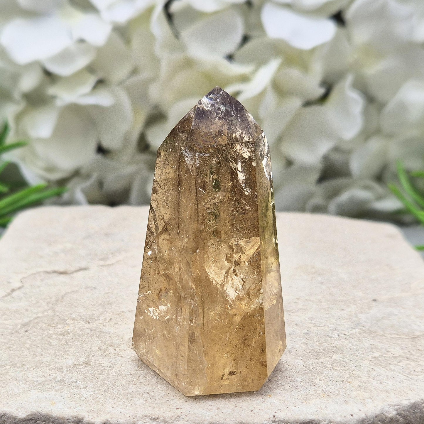 natural citrine from Brazil. Ideal crystal for decorating sacred spaces or gifting to crystal enthusiasts. Polished point ideal for your home and workspace.