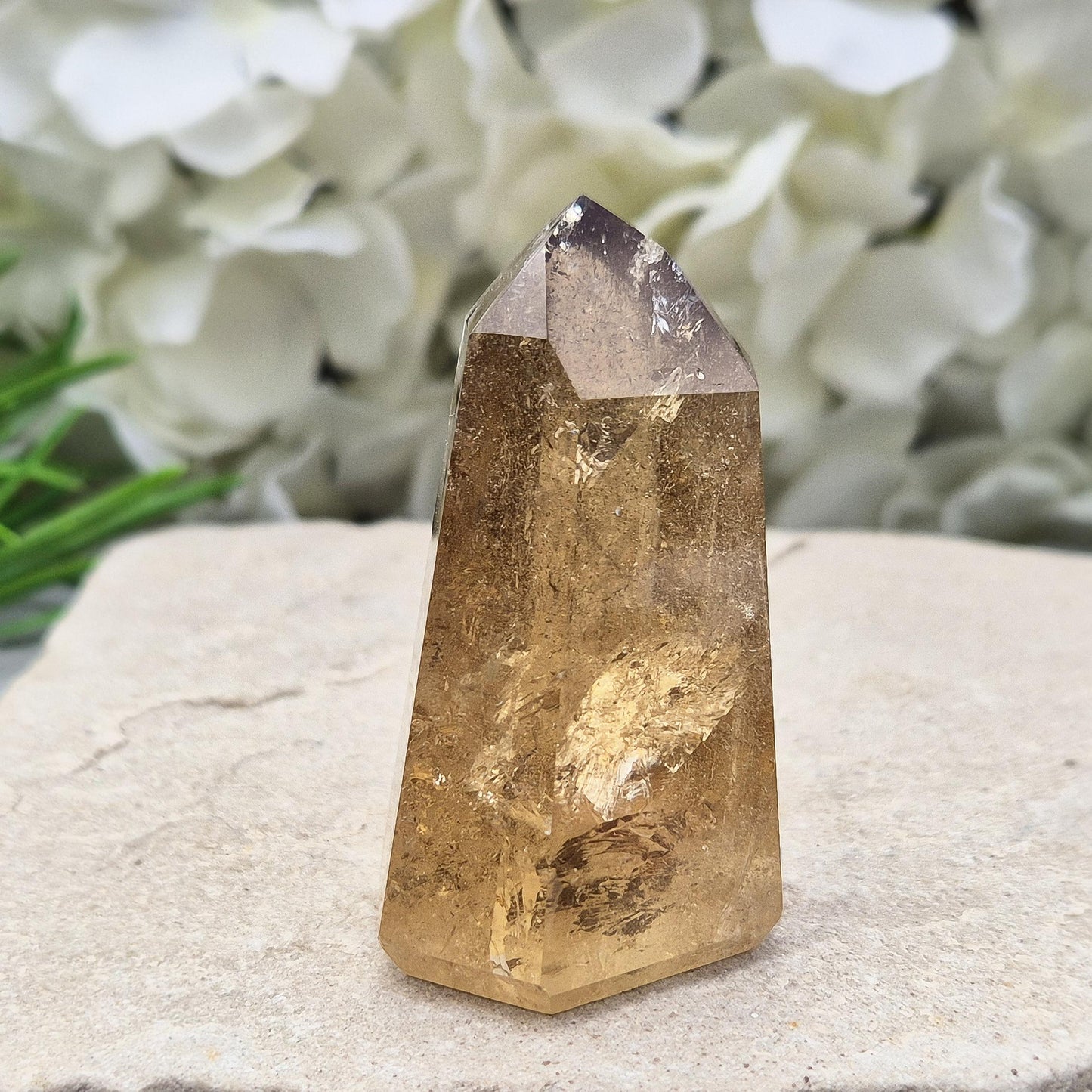 natural citrine from Brazil. Ideal crystal for decorating sacred spaces or gifting to crystal enthusiasts. Polished point ideal for your home and workspace.